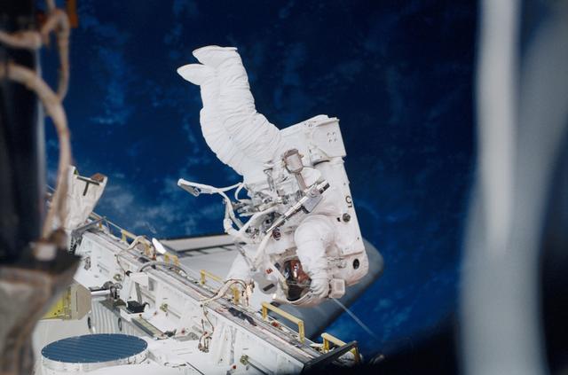 NASA image: Helms translating along the payload bay sill during an EVA