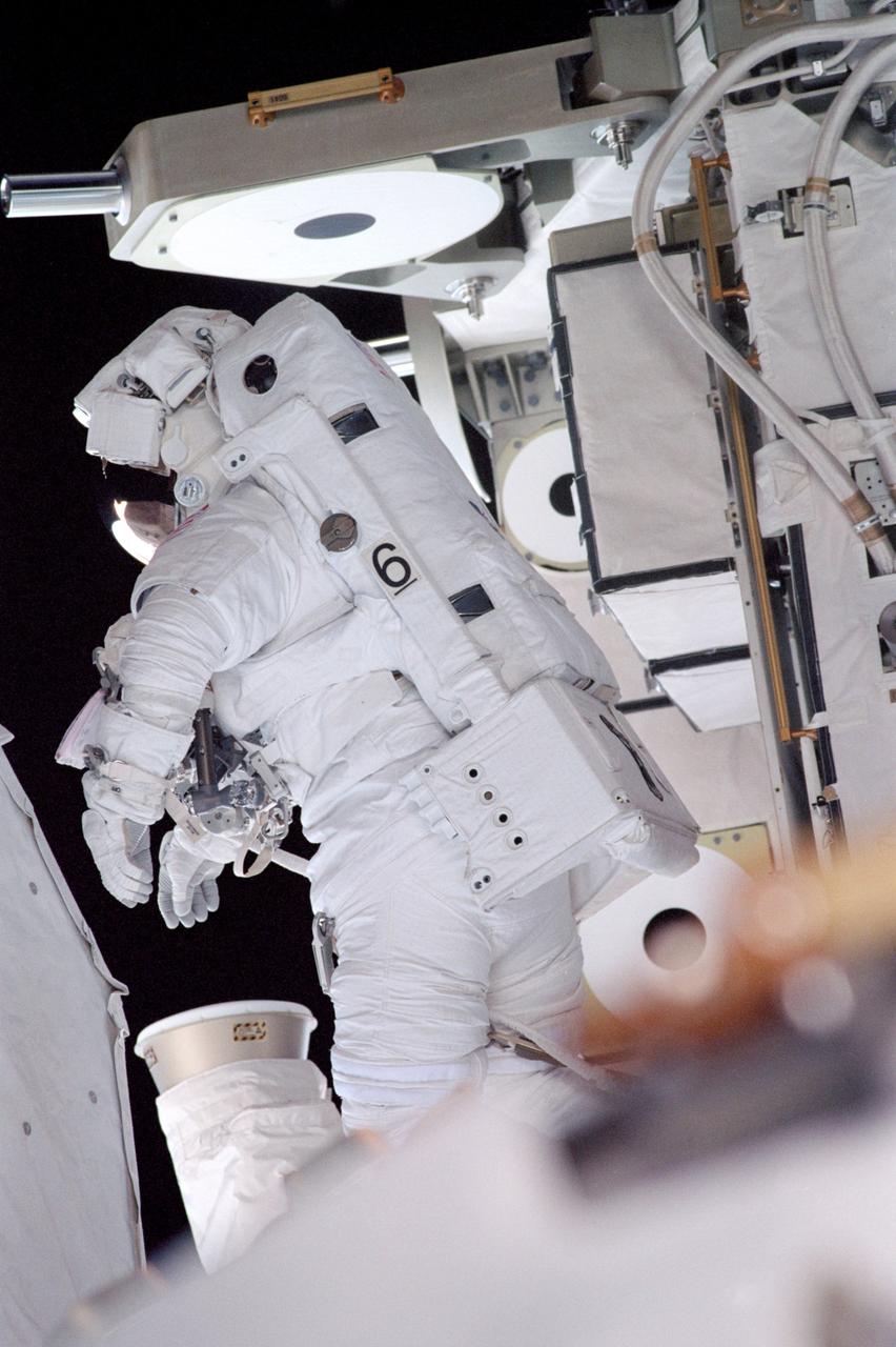 STS104-315-007 (12-24 July 2001) --- Astronaut James F. Reilly, STS-104 mission specialist,  participates in one of three space walks aimed toward wrapping up the completion of work on the second phase of the International Space Station (ISS).  Reilly was joined on the extravehicular activity (EVA) by astronaut Michael L. Gernhardt.