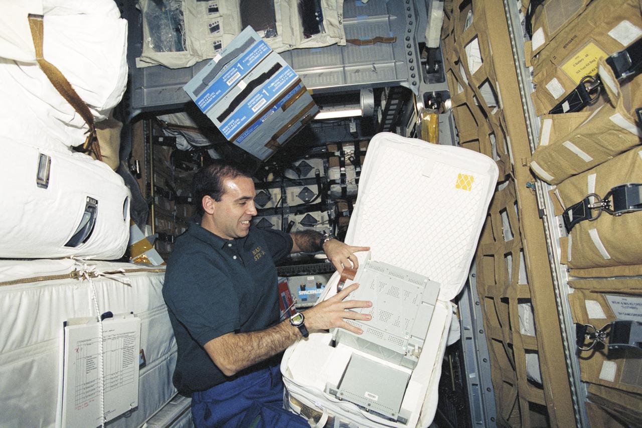 STS106-301-019 (8-20 September 2000) ---Astronaut Richard A. Mastracchio, STS-106 mission specialist, participates in the moving of supplies from the SPACEHAB Logistics Double Module on the Space Shuttle Atlantis to the International Space Station (ISS).