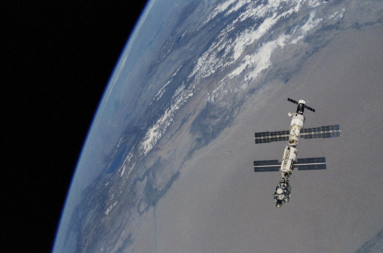 STS106-314-023 (17 September 2000) --- The International Space Station (ISS), backdropped over China&#0146;s Takla Makan desert and Earth&#0146;s horizon, is photographed after undocking with the Space Shuttle Atlantis. The 35mm frame was exposed by one of the STS-106 crew members onboard the shuttle. The undocking took place on September 17, 2000 at 10:46 p.m. (CDT).
