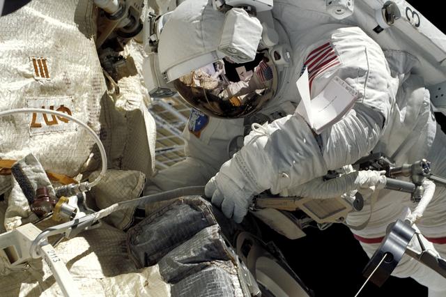 NASA image: MS Lu at work on Zvezda during STS-106's EVA