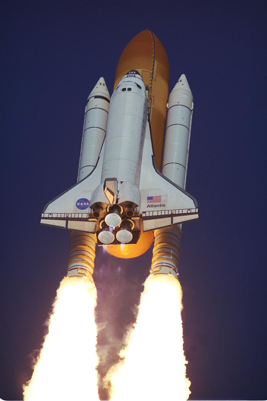 STS106-S-015 (8 September 2000) --- The Space Shuttle Atlantis streaks into the sky on mission STS-106 after a perfect on-time launch at 8:45:47 a.m. (EDT), September 8, 2000.  Blue mach diamonds are barely visible beneath the main engine nozzles. On the 11-day mission to the International Space Station, the seven-member crew will perform support tasks on orbit; transfer supplies and prepare the living quarters in the newly arrived Zvezda Service Module. The first long-duration crew is due to arrive at the Station in late fall.  Onboard the spacecraft were astronauts Terrance W. Wilcutt, Scott D. Altman, Edward T. Lu, Richard A. Mastracchio and Daniel C. Burbank, along with cosmonauts Yuri I. Malenchenko and Boris Morukov, both of whom represent Rosaviakosmos.
