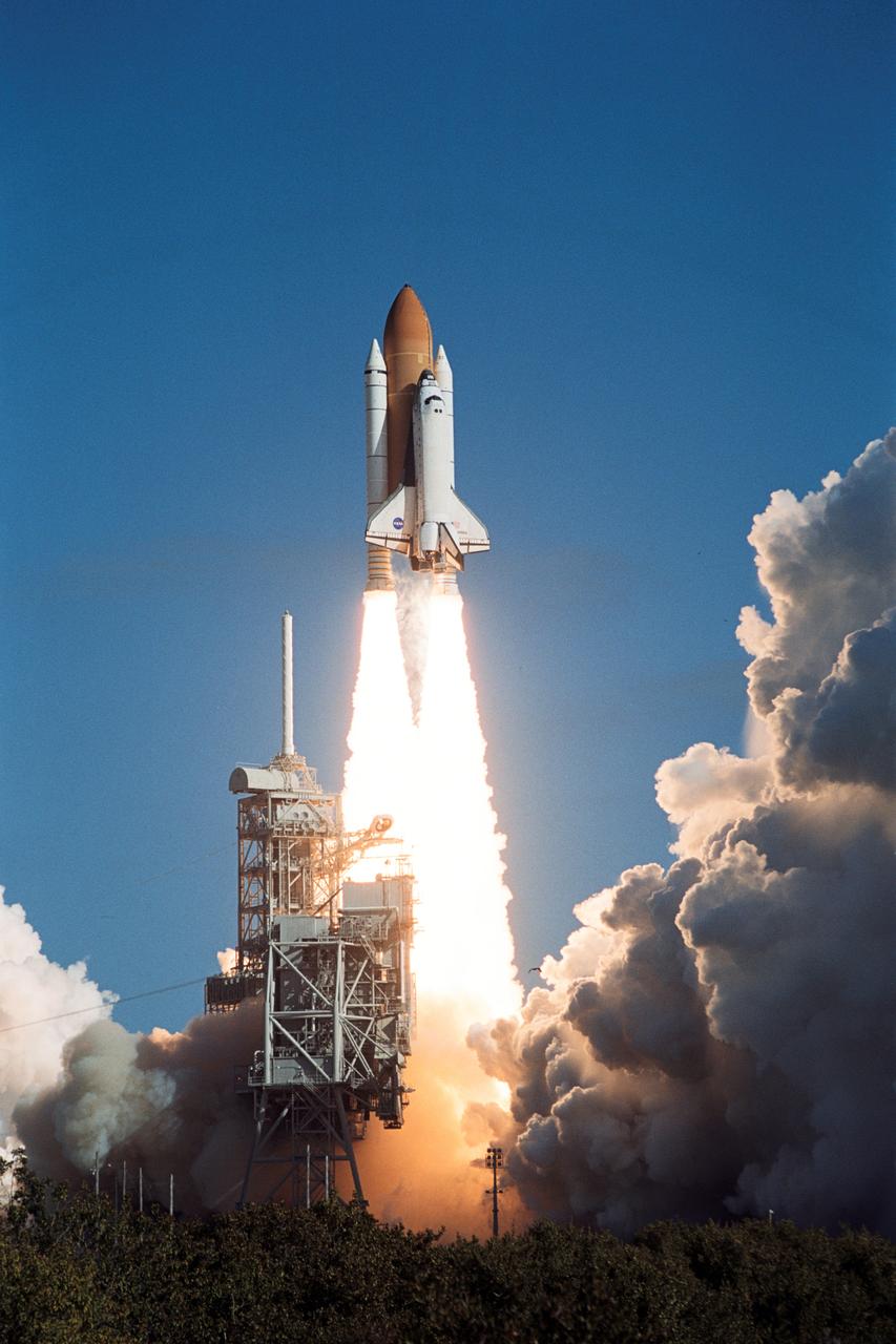 STS107-S-015 (16 Jan. 2003) --- The Space Shuttle Columbia leaves Launch Pad 39A for STS-107.  Following a flawless and uneventful countdown, liftoff occurred on-time at 10:39 a.m. (EST). Photo credit: NASA