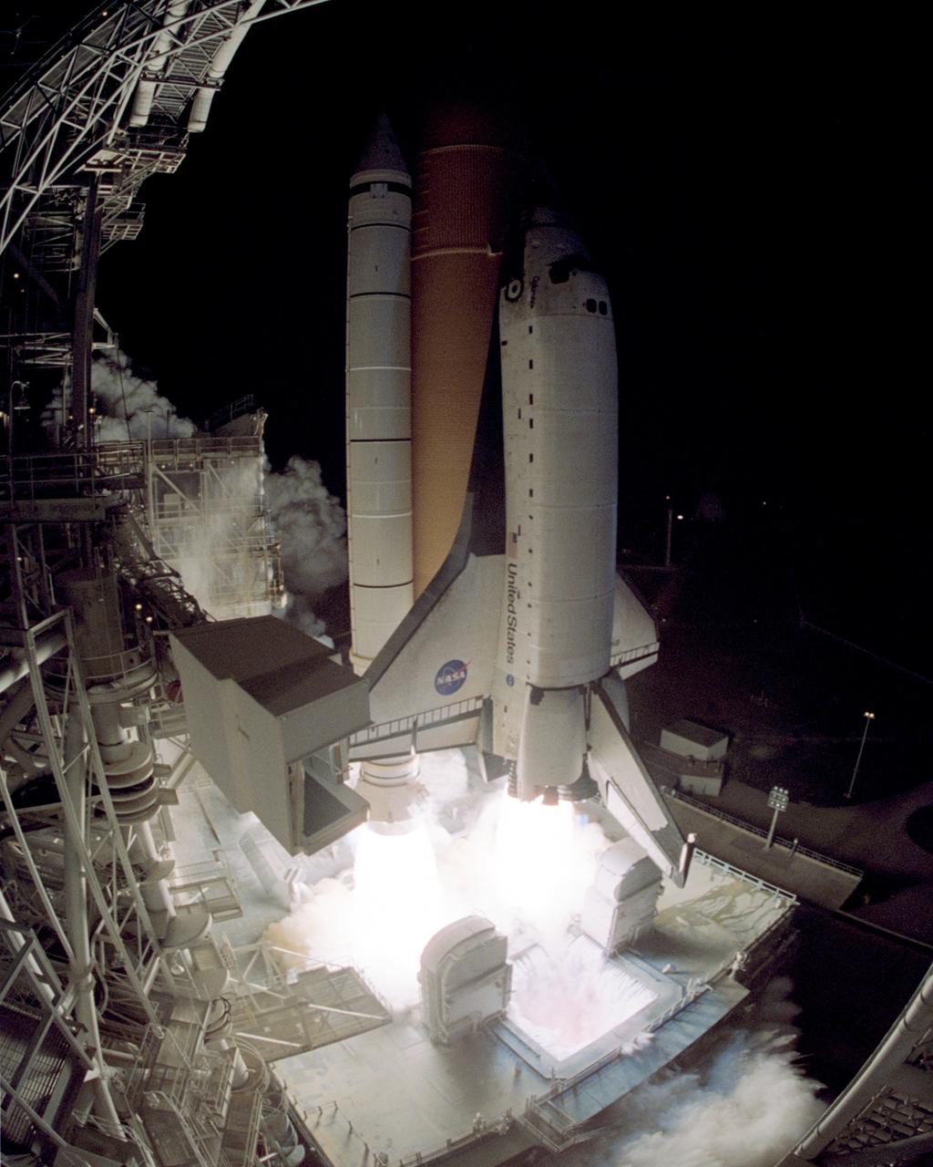STS109-S-005 (1 March 2002) --- The  Space Shuttle Columbia begins its 27th flight in the pre-dawn hours from Launch Pad 39A.  Liftoff for STS-109 occurred at 6:22:02:08 a.m., EST (11:22:02:08 GMT). The goal of the mission is the maintenance and upgrade of the Hubble Space Telescope, to be carried out in five space walks. On board the spacecraft were astronauts Scott D. Altman, Duane G. Carey, Nancy J. Currie, John M. Grunsfeld, James H. Newman, Richard M. Linnehan and Michael J. Massimino.