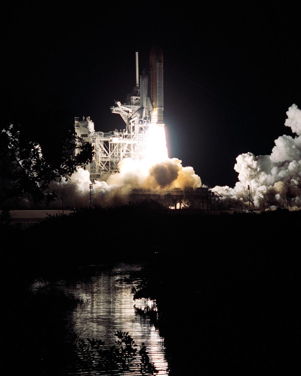 STS109-S-006 (1 March 2002) --- The  Space Shuttle Columbia begins its 27th flight in the pre-dawn hours from Launch Pad 39A.  Liftoff for STS-109 occurred at 6:22:02:08 a.m., EST (11:22:02:08 GMT). The goal of the mission is the maintenance and upgrade of the Hubble Space Telescope, to be carried out in five space walks. On board the spacecraft were astronauts Scott D. Altman, Duane G. Carey, Nancy J. Currie, John M. Grunsfeld, James H. Newman, Richard M. Linnehan and Michael J. Massimino.