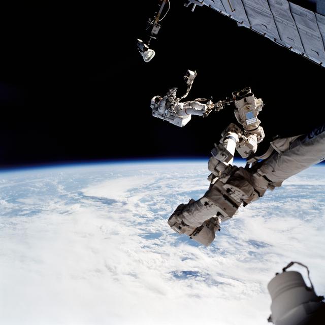 NASA image: EVA 2 - MS Wolf with EVA tool kit on SSRMS