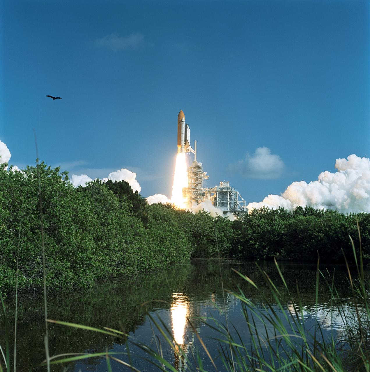 STS112-S-008 (7 October 2002) --- A distant camera records the launch of mission STS-112, the 15th assembly flight to the International Space Station. Liftoff from Launch Pad 39B occurred at 3:46 p.m. (EDT), October 7, 2002. Atlantis carried the S1 Integrated Truss Structure and the Crew and Equipment Translation Aid (CETA) Cart A. The CETA is the first of two human-powered carts that will ride along the ISS railway, providing mobile work platforms for future spacewalking astronauts. On the 11-day mission, three spacewalks were successful in attaching the S1 truss to the Station and performing other scheduled ISS work. The STS-112 crew members of Atlantis are Jeffrey S. Ashby, commander; Pamela A. Melroy, pilot; and David A. Wolf, Piers J. Sellers, Sandra H. Magnus and Rosaviakosmos' Fyodor N. Yurchikhin, all mission specialists.