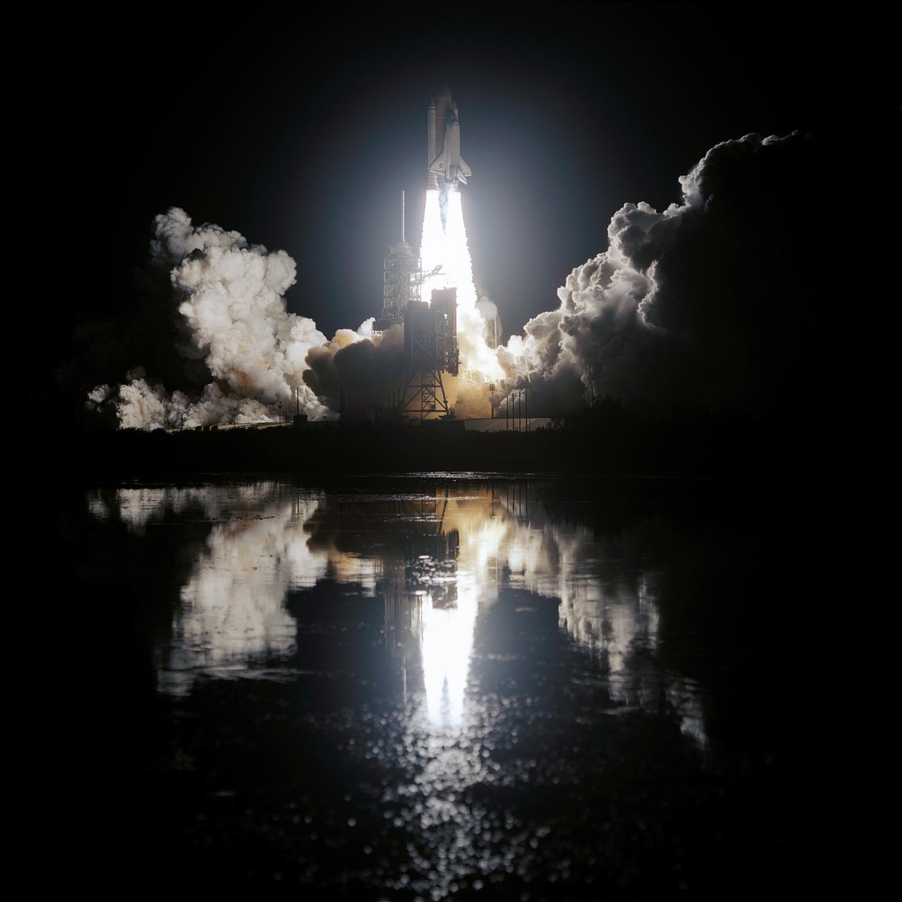 STS113-S-007 (23 November 2002) --- Against a black night sky, the Space Shuttle Endeavour heads toward Earth orbit and a scheduled link-up with the International Space Station (ISS). Liftoff from the Kennedy Space Center's Launch Complex 39 occurred at 7:49:47 p.m. (EST), November 23, 2002. The launch is the 19th for Endeavour, and the 112th flight in the Shuttle program. Mission STS-113 is the 16th assembly flight to the International Space Station, carrying another structure for the Station, the P1 integrated truss. Crewmembers onboard were astronauts James D. Wetherbee, commander; Paul S. Lockhart, pilot, along with astronauts Michael E. Lopez-Alegria and John B. Herrington, both mission specialists. Also onboard were the Expedition 6 crewmembers--astronauts Kenneth D. Bowersox and Donald R. Pettit, along with cosmonaut Nikolai M. Budarin--who went on to replace Expedition 5 aboard the Station.
