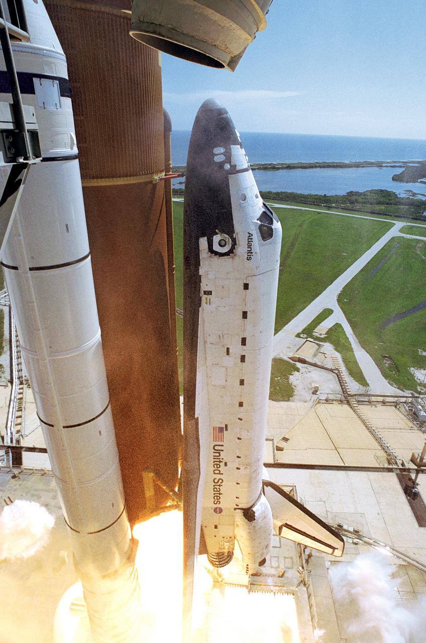 STS115-S-032 (9 Sept. 2006) --- The Space Shuttle Atlantis and its six-member crew launch at 11:15 a.m. (EDT) to begin the two-day journey to the International Space Station on the STS-115 mission. Atlantis is slated to dock with the station on Monday Sept. 11, 2006. During the 11-day mission, the STS-115 crew of six will resume construction of the station. The shuttle and station crews will work with ground teams to install a girder-like structure, known as the P3/P4 truss aboard the station. The 35,000-pound piece includes a set of giant solar arrays, batteries and associated electronics. The arrays eventually will double the station's power capability.