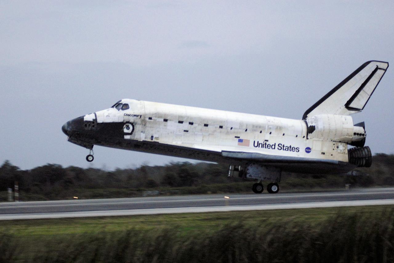 STS116-S-058 (22 Dec. 2006) --- As the sun sets, Discovery's main landing gear touches down on Runway 15 at NASA Kennedy Space Center's Shuttle Landing Facility, concluding mission STS-116. Aboard are astronauts Mark L. Polansky, commander; William A. Oefelein, pilot; and Robert L. Curbeam Jr., Joan E. Higginbotham, Nicholas J.M. Patrick and European Space Agency astronauts Christer Fuglesang and Thomas Reiter--all mission specialists. Reiter is returning from a six-month stay on the International Space Station. During the mission, three spacewalks attached the P5 integrated truss structure to the station, and completed the rewiring of the orbiting laboratory's power system. A contingency spacewalk was added to retract a stubborn solar array. Main gear touchdown was at 5:32 p.m. (EST). Nose gear touchdown was at 5:32:12 p.m. and wheel stop was at 5:32:52 p.m. At touchdown -- nominally about 2,500 ft. beyond the runway threshold -- the orbiter is traveling at a speed ranging from 213 to 226 mph. Discovery traveled 5,330,000 miles, landing on orbit 204. Mission elapsed time was 12 days, 20 hours, 44 minutes and 16 seconds. This is the 64th landing at KSC.
