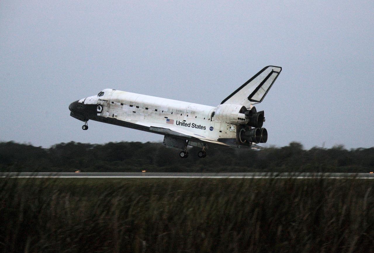 STS116-S-060 (22 Dec. 2006) --- Discovery's main landing gear is about to touch down on Runway 15 at NASA Kennedy Space Center's Shuttle Landing Facility, concluding mission STS-116. Aboard are astronauts Mark L. Polansky, commander; William A. Oefelein, pilot; and Robert L. Curbeam Jr., Joan E. Higginbotham, Nicholas J.M. Patrick and European Space Agency astronauts Christer Fuglesang and Thomas Reiter--all mission specialists. Reiter is returning from a six-month stay on the International Space Station. During the mission, three spacewalks attached the P5 integrated truss structure to the station, and completed the rewiring of the orbiting laboratory's power system. A contingency spacewalk was added to retract a stubborn solar array. Main gear touchdown was at 5:32 p.m. (EST). Nose gear touchdown was at 5:32:12 p.m. and wheel stop was at 5:32:52 p.m. At touchdown -- nominally about 2,500 ft. beyond the runway threshold -- the orbiter is traveling at a speed ranging from 213 to 226 mph. Discovery traveled 5,330,000 miles, landing on orbit 204. Mission elapsed time was 12 days, 20 hours, 44 minutes and 16 seconds. This is the 64th landing at KSC.