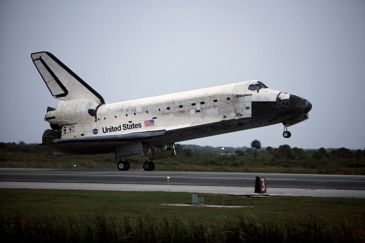 STS116-S-077 (22 Dec. 2006) --- As the sun sets, Discovery's main landing gear touches down on Runway 15 at NASA Kennedy Space Center's Shuttle Landing Facility, concluding mission STS-116. Aboard are astronauts Mark L. Polansky, commander; William A. Oefelein, pilot; and Robert L. Curbeam Jr., Joan E. Higginbotham, Nicholas J.M. Patrick and European Space Agency astronauts Christer Fuglesang and Thomas Reiter--all mission specialists. Reiter is returning from a six-month stay on the International Space Station. During the mission, three spacewalks attached the P5 integrated truss structure to the station, and completed the rewiring of the orbiting laboratory's power system. A contingency spacewalk was added to retract a stubborn solar array. Main gear touchdown was at 5:32 p.m. (EST). Nose gear touchdown was at 5:32:12 p.m. and wheel stop was at 5:32:52 p.m. At touchdown -- nominally about 2,500 ft. beyond the runway threshold -- the orbiter is traveling at a speed ranging from 213 to 226 mph. Discovery traveled 5,330,000 miles, landing on orbit 204. Mission elapsed time was 12 days, 20 hours, 44 minutes and 16 seconds. This is the 64th landing at KSC.