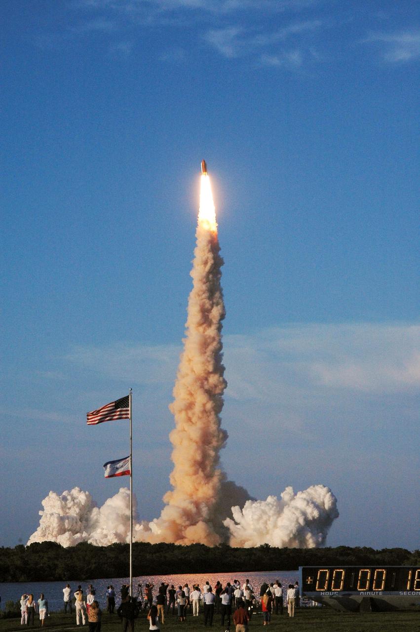 STS117-S-008 (8 June 2007) --- The Space Shuttle Atlantis and its seven-member STS-117 crew head toward Earth-orbit and a scheduled link-up with the International Space Station. Liftoff from Kennedy Space Center's launch pad 39A occurred at 7:38 p.m. (EDT) on June 8, 2007. Onboard are astronauts Rick Sturckow, commander; Lee Archambault, pilot; Jim Reilly, Patrick Forrester, John "Danny" Olivas, Steven Swanson and Clayton Anderson, all mission specialists. Anderson will join Expedition 15 in progress to serve as a flight engineer aboard the station. Atlantis will dock with the orbital outpost on Sunday, June 10, to begin a joint mission that will increase the complex's power generation capability. Using the shuttle and station robotic arms and conducting three scheduled spacewalks, the astronauts will install another set of giant solar array wings on the station and retract another array, preparing it for a future move.