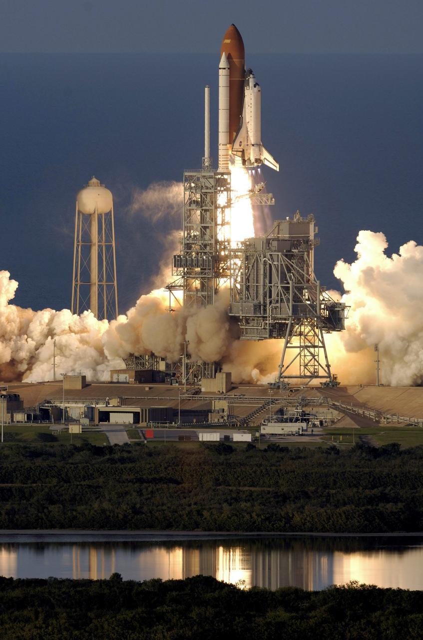 STS117-S-020 (8 June 2007) --- The Space Shuttle Atlantis and its seven-member STS-117 crew head toward Earth-orbit and a scheduled link-up with the International Space Station. Liftoff from Kennedy Space Center's launch pad 39A occurred at 7:38 p.m. (EDT) on June 8, 2007. Onboard are astronauts Rick Sturckow, commander; Lee Archambault, pilot; Jim Reilly, Patrick Forrester, John "Danny" Olivas, Steven Swanson and Clayton Anderson, all mission specialists. Anderson will join Expedition 15 in progress to serve as a flight engineer aboard the station. Atlantis will dock with the orbital outpost on Sunday, June 10, to begin a joint mission that will increase the complex's power generation capability. Using the shuttle and station robotic arms and conducting three scheduled spacewalks, the astronauts will install another set of giant solar array wings on the station and retract another array, preparing it for a future move.