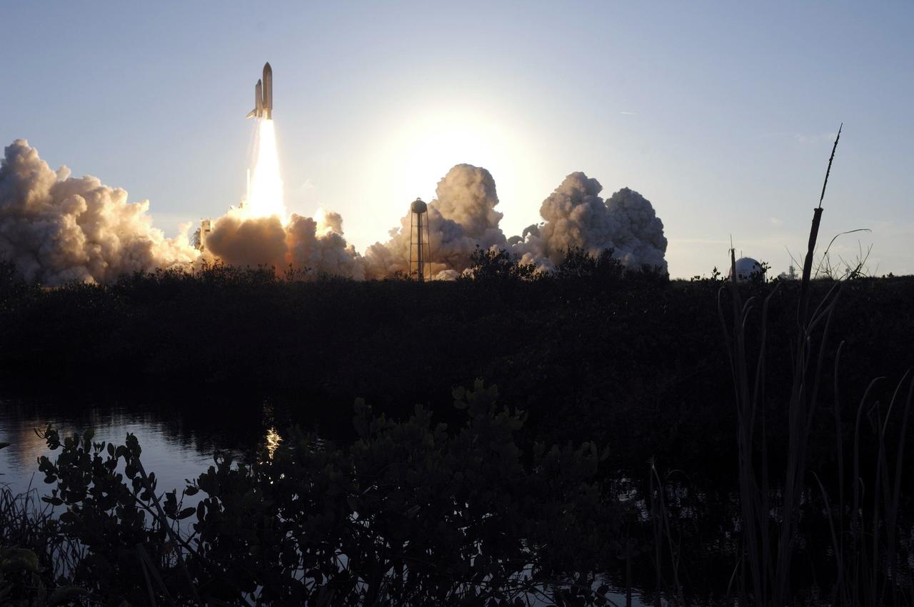 STS117-S-024 (8 June 2007) --- The Space Shuttle Atlantis and its seven-member STS-117 crew head toward Earth-orbit and a scheduled link-up with the International Space Station. Liftoff from Kennedy Space Center's launch pad 39A occurred at 7:38 p.m. (EDT) on June 8, 2007. Onboard are astronauts Rick Sturckow, commander; Lee Archambault, pilot; Jim Reilly, Patrick Forrester, John "Danny" Olivas, Steven Swanson and Clayton Anderson, all mission specialists. Anderson will join Expedition 15 in progress to serve as a flight engineer aboard the station. Atlantis will dock with the orbital outpost on Sunday, June 10, to begin a joint mission that will increase the complex's power generation capability. Using the shuttle and station robotic arms and conducting three scheduled spacewalks, the astronauts will install another set of giant solar array wings on the station and retract another array, preparing it for a future move.