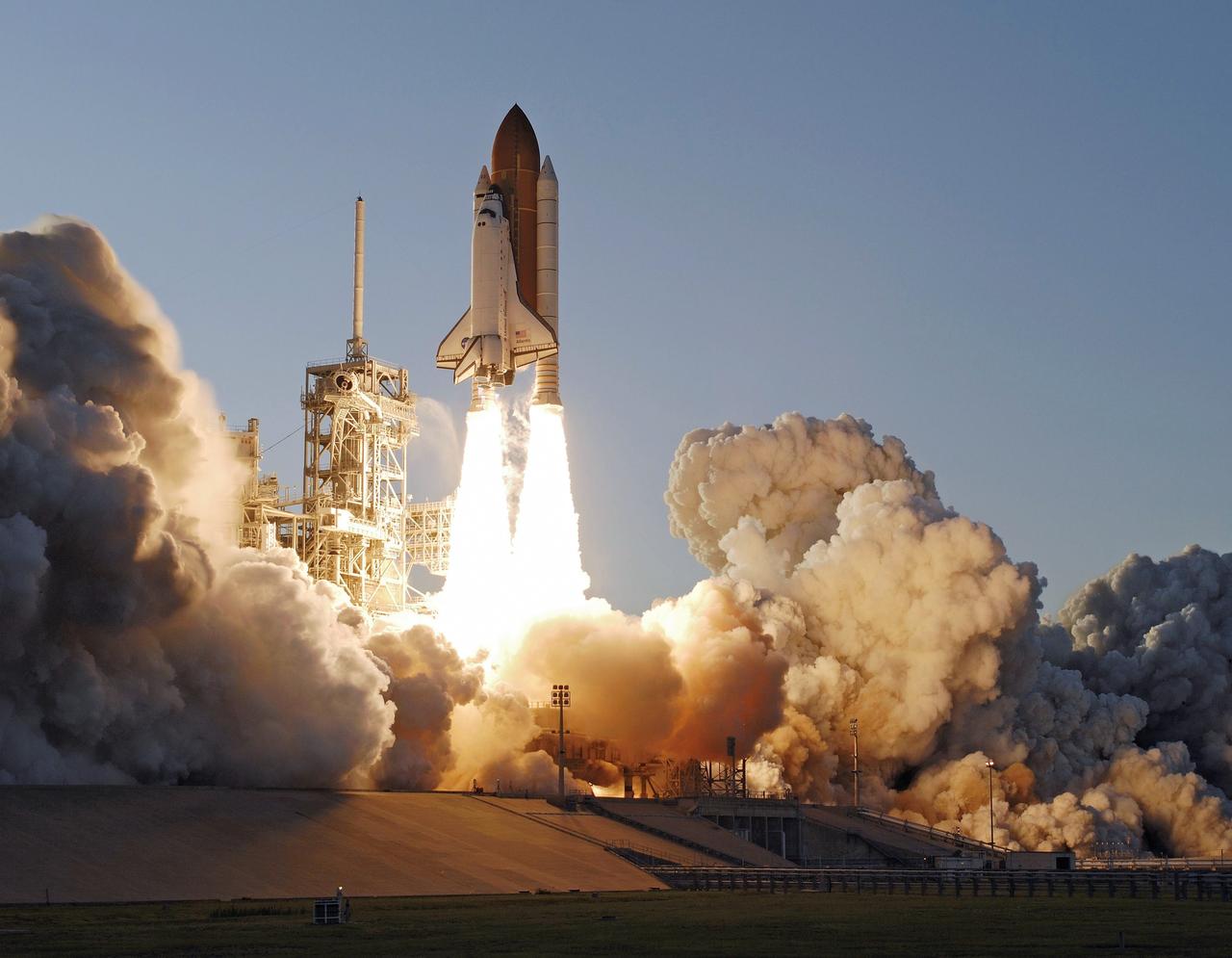 STS117-S-027 (8 June 2007) --- The Space Shuttle Atlantis and its seven-member STS-117 crew head toward Earth-orbit and a scheduled link-up with the International Space Station. Liftoff from Kennedy Space Center's launch pad 39A occurred at 7:38 p.m. (EDT) on June 8, 2007. Onboard are astronauts Rick Sturckow, commander; Lee Archambault, pilot; Jim Reilly, Patrick Forrester, John "Danny" Olivas, Steven Swanson and Clayton Anderson, all mission specialists. Anderson will join Expedition 15 in progress to serve as a flight engineer aboard the station. Atlantis will dock with the orbital outpost on Sunday, June 10, to begin a joint mission that will increase the complex's power generation capability. Using the shuttle and station robotic arms and conducting three scheduled spacewalks, the astronauts will install another set of giant solar array wings on the station and retract another array, preparing it for a future move.