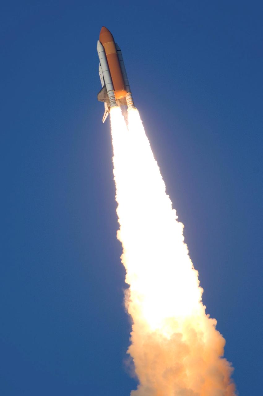 STS117-S-031 (8 June 2007) --- The Space Shuttle Atlantis and its seven-member STS-117 crew head toward Earth-orbit and a scheduled link-up with the International Space Station. Liftoff from Kennedy Space Center's launch pad 39A occurred at 7:38 p.m. (EDT) on June 8, 2007. Onboard are astronauts Rick Sturckow, commander; Lee Archambault, pilot; Jim Reilly, Patrick Forrester, John "Danny" Olivas, Steven Swanson and Clayton Anderson, all mission specialists. Anderson will join Expedition 15 in progress to serve as a flight engineer aboard the station. Atlantis will dock with the orbital outpost on Sunday, June 10, to begin a joint mission that will increase the complex's power generation capability. Using the shuttle and station robotic arms and conducting three scheduled spacewalks, the astronauts will install another set of giant solar array wings on the station and retract another array, preparing it for a future move.