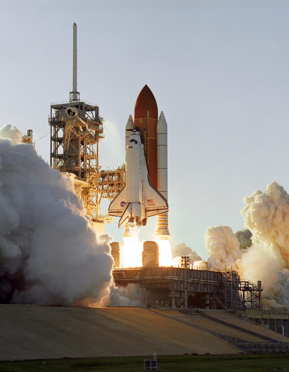 STS117-S-033 (8 June 2007) --- The Space Shuttle Atlantis and its seven-member STS-117 crew head toward Earth-orbit and a scheduled link-up with the International Space Station. Liftoff from Kennedy Space Center's launch pad 39A occurred at 7:38 p.m. (EDT) on June 8, 2007. Onboard are astronauts Rick Sturckow, commander; Lee Archambault, pilot; Jim Reilly, Patrick Forrester, John "Danny" Olivas, Steven Swanson and Clayton Anderson, all mission specialists. Anderson will join Expedition 15 in progress to serve as a flight engineer aboard the station. Atlantis will dock with the orbital outpost on Sunday, June 10, to begin a joint mission that will increase the complex's power generation capability. Using the shuttle and station robotic arms and conducting three scheduled spacewalks, the astronauts will install another set of giant solar array wings on the station and retract another array, preparing it for a future move.