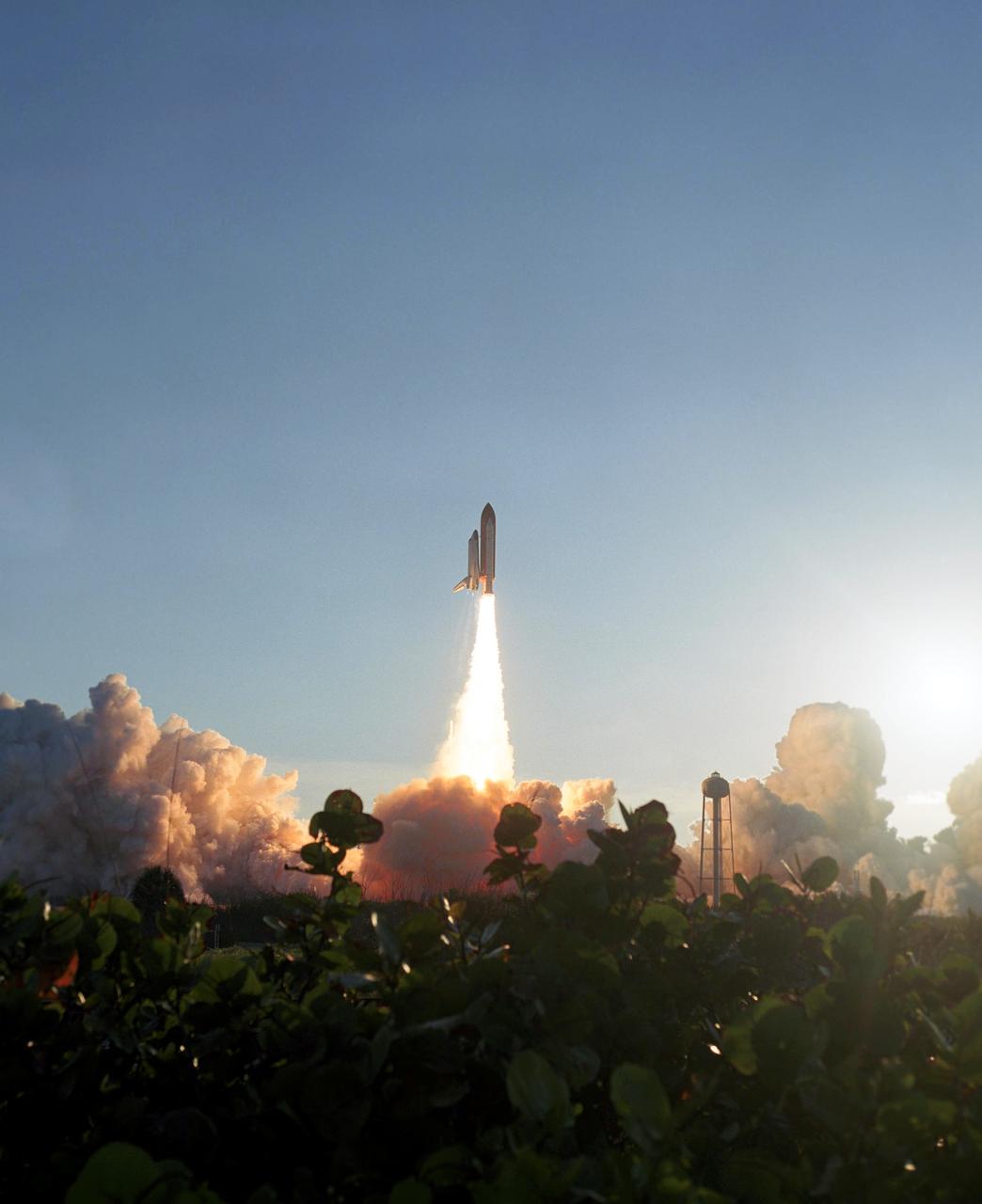 STS117-S-035 (8 June 2007) --- The Space Shuttle Atlantis and its seven-member STS-117 crew head toward Earth-orbit and a scheduled link-up with the International Space Station. Liftoff from Kennedy Space Center's launch pad 39A occurred at 7:38 p.m. (EDT) on June 8, 2007. Onboard are astronauts Rick Sturckow, commander; Lee Archambault, pilot; Jim Reilly, Patrick Forrester, John "Danny" Olivas, Steven Swanson and Clayton Anderson, all mission specialists. Anderson will join Expedition 15 in progress to serve as a flight engineer aboard the station. Atlantis will dock with the orbital outpost on Sunday, June 10, to begin a joint mission that will increase the complex's power generation capability. Using the shuttle and station robotic arms and conducting three scheduled spacewalks, the astronauts will install another set of giant solar array wings on the station and retract another array, preparing it for a future move.