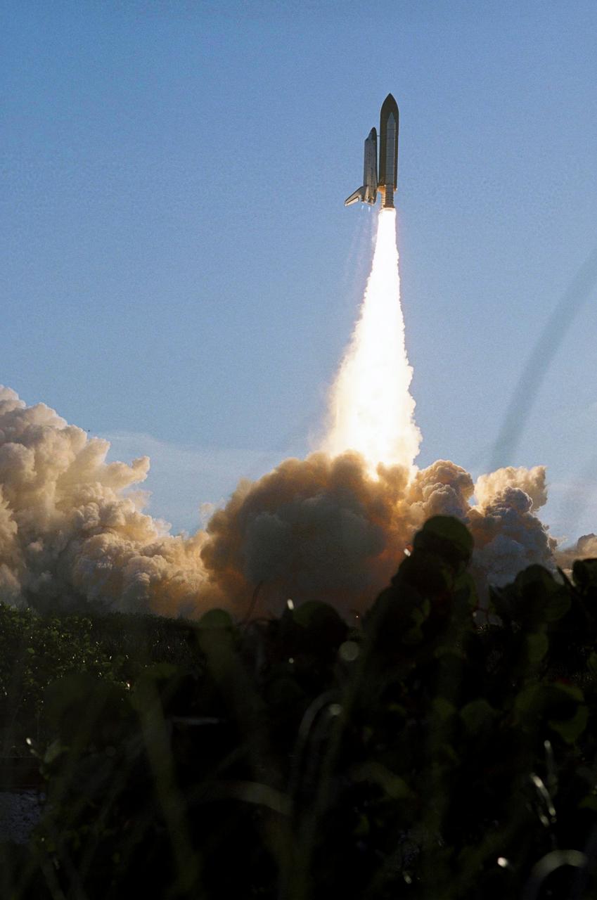 STS117-S-036 (8 June 2007) --- The Space Shuttle Atlantis and its seven-member STS-117 crew head toward Earth-orbit and a scheduled link-up with the International Space Station. Liftoff from Kennedy Space Center's launch pad 39A occurred at 7:38 p.m. (EDT) on June 8, 2007. Onboard are astronauts Rick Sturckow, commander; Lee Archambault, pilot; Jim Reilly, Patrick Forrester, John "Danny" Olivas, Steven Swanson and Clayton Anderson, all mission specialists. Anderson will join Expedition 15 in progress to serve as a flight engineer aboard the station. Atlantis will dock with the orbital outpost on Sunday, June 10, to begin a joint mission that will increase the complex's power generation capability. Using the shuttle and station robotic arms and conducting three scheduled spacewalks, the astronauts will install another set of giant solar array wings on the station and retract another array, preparing it for a future move.