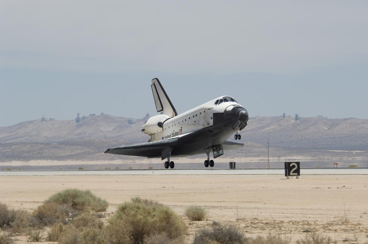 STS117-S-047 (22 June 2007) --- Space Shuttle Atlantis' main landing gear touches down on runway 22 at NASA's Dryden Flight Research Center at Edwards Air Force Base in California concluding a successful assembly mission to the International Space Station. Atlantis landed on orbit 219 after 13 days, 20 hours and 12 minutes in space. The landing was diverted to California due to marginal weather at the Kennedy Space Center. Main gear touchdown was at 12:49:38 p.m. (PDT). Nose gear touchdown was at 12:49:49 p.m. and wheel stop was at 12:50:48 p.m. This was the 51st landing for the Space Shuttle Program at Edwards Air Force Base. The mission to the station was a success, installing and activating the S3/S4 truss and retracting the P6 arrays. Onboard were astronauts Rick Sturckow, commander; Lee Archambault, pilot; Jim Reilly, Steven Swanson, Patrick Forrester and John "Danny" Olivas, all STS-117 mission specialists. Also onboard was astronaut Sunita Williams, who was flight engineer on the Expedition 15 crew. She achieved a new milestone, a record-setting flight at 194 days, 18 hours and 58 minutes, the longest single spaceflight ever by a female astronaut or cosmonaut.