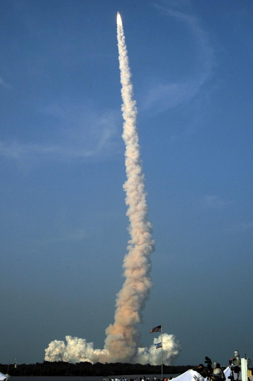 STS118-S-012 (8 Aug. 2007) --- The Space Shuttle Endeavour and its seven-member STS-118 crew head toward Earth-orbit and a scheduled link-up with the International Space Station. Liftoff from Kennedy Space Center's launch pad 39A occurred at 6:36 p.m. (EDT) on Aug. 8, 2007. Onboard are astronauts Scott Kelly, commander; Charlie Hobaugh, pilot; Tracy Caldwell, Rick Mastracchio, Canadian Space Agency's Dave Williams, Barbara R. Morgan and Alvin Drew, all mission specialists. Endeavour will link up with the International Space Station on Friday, Aug. 10, to begin a joint mission to continue construction by delivering a third starboard truss segment, S5, and other payloads such as the SPACEHAB module and the external stowage platform 3. The 11-day mission may be extended to as many as 14 depending on the test of the Station-to-Shuttle Power Transfer System that will allow the docked shuttle to draw electrical power from the station and extend its visits to the orbital complex.