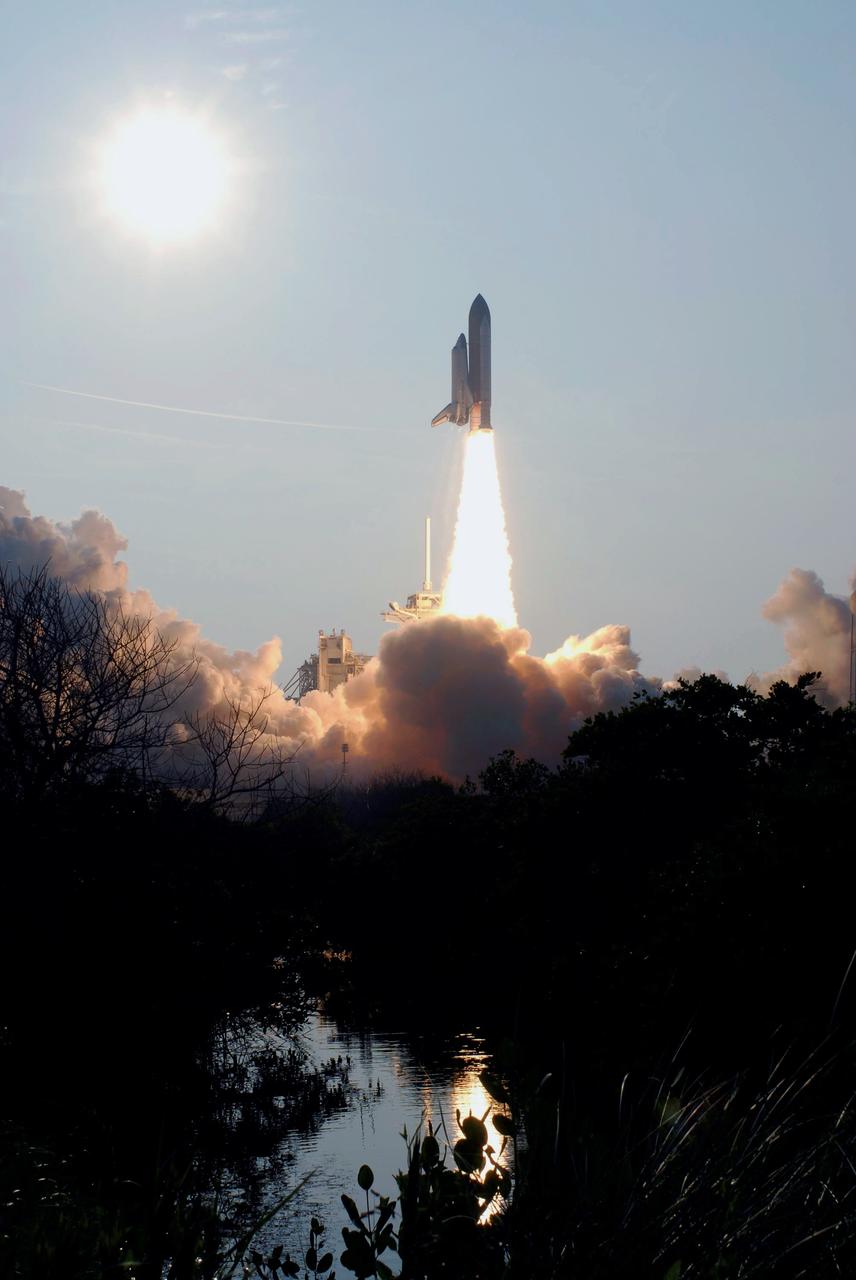 STS118-S-027 (8 Aug. 2007) --- The Space Shuttle Endeavour and its seven-member STS-118 crew head toward Earth-orbit and a scheduled link-up with the International Space Station. Liftoff from Kennedy Space Center's launch pad 39A occurred at 6:36 p.m. (EDT) on Aug. 8, 2007. Onboard are astronauts Scott Kelly, commander; Charlie Hobaugh, pilot; Tracy Caldwell, Rick Mastracchio, Canadian Space Agency's Dave Williams, Barbara R. Morgan and Alvin Drew, all mission specialists. Endeavour will link up with the International Space Station on Friday, Aug. 10, to begin a joint mission to continue construction by delivering a third starboard truss segment, S5, and other payloads such as the SPACEHAB module and the external stowage platform 3. The 11-day mission may be extended to as many as 14 depending on the test of the Station-to-Shuttle Power Transfer System that will allow the docked shuttle to draw electrical power from the station and extend its visits to the orbital complex.