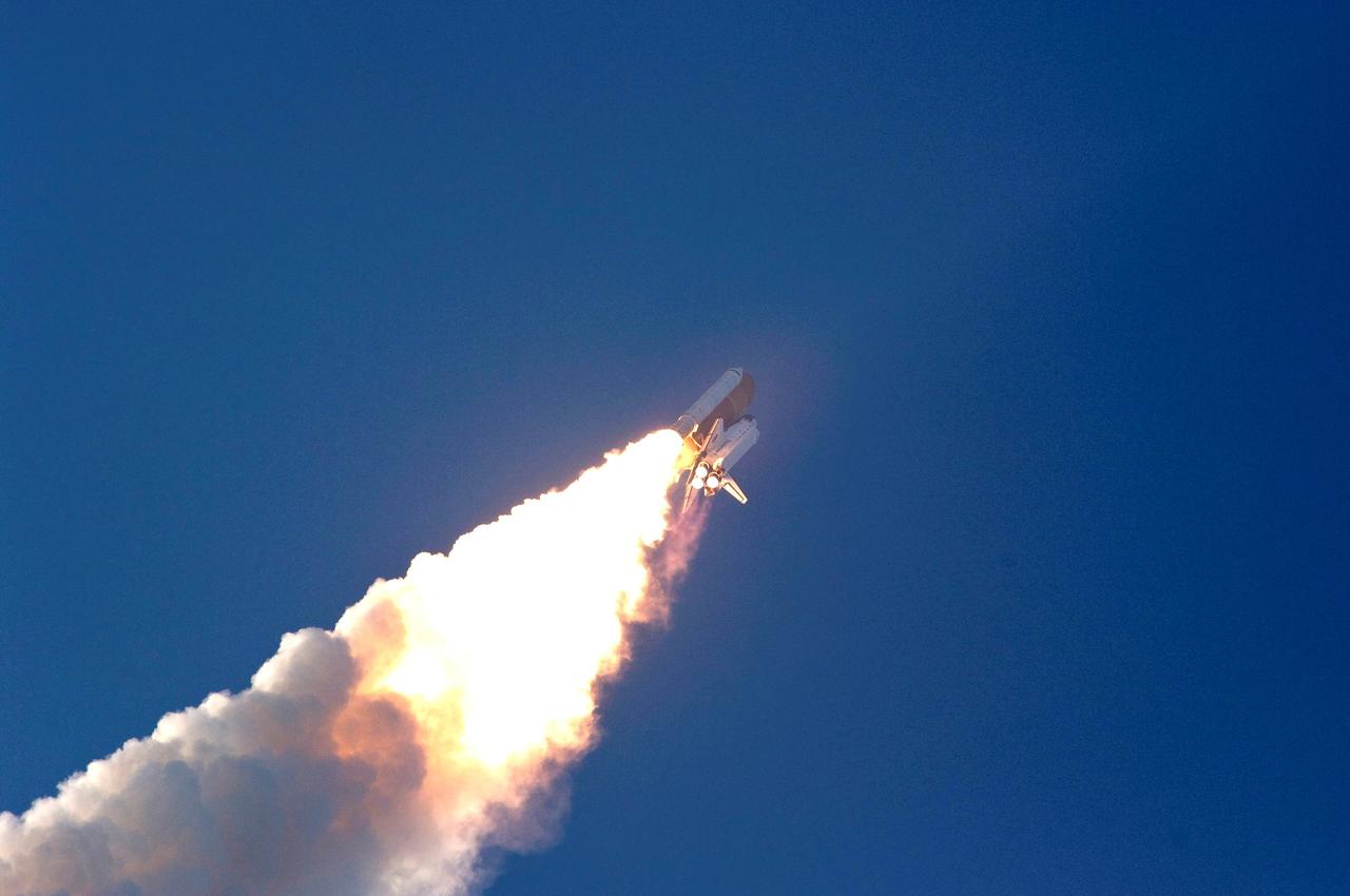 STS118-S-029 (8 Aug. 2007) --- The Space Shuttle Endeavour and its seven-member STS-118 crew head toward Earth-orbit and a scheduled link-up with the International Space Station. Liftoff from Kennedy Space Center's launch pad 39A occurred at 6:36 p.m. (EDT) on Aug. 8, 2007. Onboard are astronauts Scott Kelly, commander; Charlie Hobaugh, pilot; Tracy Caldwell, Rick Mastracchio, Canadian Space Agency's Dave Williams, Barbara R. Morgan and Alvin Drew, all mission specialists. Endeavour will link up with the International Space Station on Friday, Aug. 10, to begin a joint mission to continue construction by delivering a third starboard truss segment, S5, and other payloads such as the SPACEHAB module and the external stowage platform 3. The 11-day mission may be extended to as many as 14 depending on the test of the Station-to-Shuttle Power Transfer System that will allow the docked shuttle to draw electrical power from the station and extend its visits to the orbital complex.