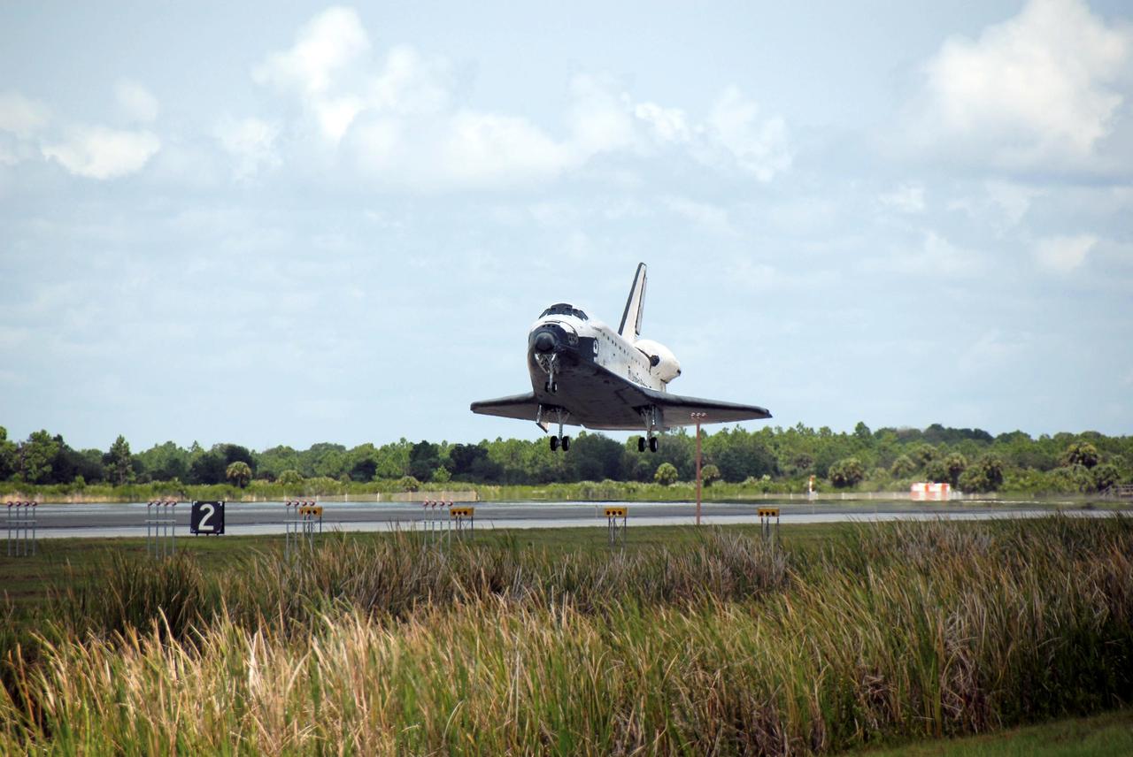 STS118-S-067 (21 Aug. 2007) --- Space Shuttle Endeavour approaches touchdown on runway 15 at NASA's Kennedy Space Center completing a 13-day mission to the International Space Station. Aboard are astronauts Scott Kelly, STS-118 commander; Charlie Hobaugh, pilot; Rick Mastracchio, Canadian Space Agency's Dave Williams, Barbara R. Morgan, Tracy Caldwell and Alvin Drew, all mission specialists. The STS-118 mission began Aug. 8 and installed a new gyroscope, an external spare parts platform and another truss segment to the expanding station. Endeavour's main gear touched down at 12:32:16 p.m. (EDT). Nose gear touchdown was at 12:32:29 p.m. and wheel stop was at 12:33:20 p.m. Endeavour traveled nearly 5.3 million miles, landing on orbit 201. STS-118 was the 119th space shuttle flight, the 22nd flight to the station, the 20th flight for Endeavour and the second of four missions planned for 2007.