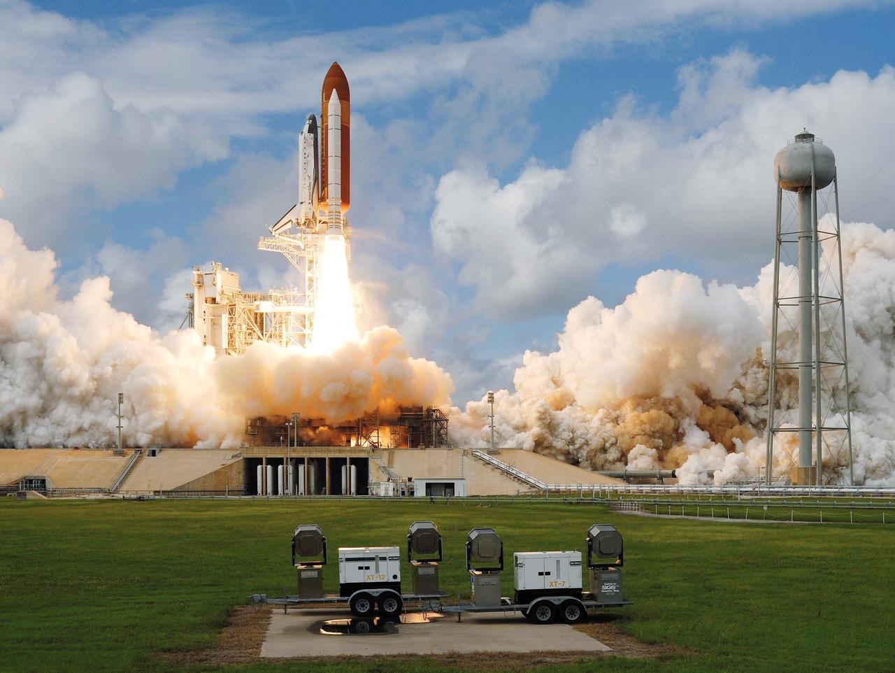 STS120-S-029 (23 Oct. 2007) --- The Space Shuttle Discovery and its seven-member STS-120 crew head toward Earth-orbit and a scheduled link-up with the International Space Station. Liftoff from Kennedy Space Center's launch pad 39A occurred at 11:38:19 a.m. (EDT). Onboard are astronauts Pam Melroy, commander; George Zamka, pilot; Scott Parazynski, Stephanie Wilson, Doug Wheelock, European Space Agency's (ESA) Paolo Nespoli and Daniel Tani, all mission specialists. Discovery will link up with the station on Thursday, Oct. 25, to begin a joint mission to continue construction by delivering the Italian-built U.S. Node 2, called Harmony. During the 14-day mission, the crew will install Harmony and move the P6 solar arrays to their permanent position and deploy them.