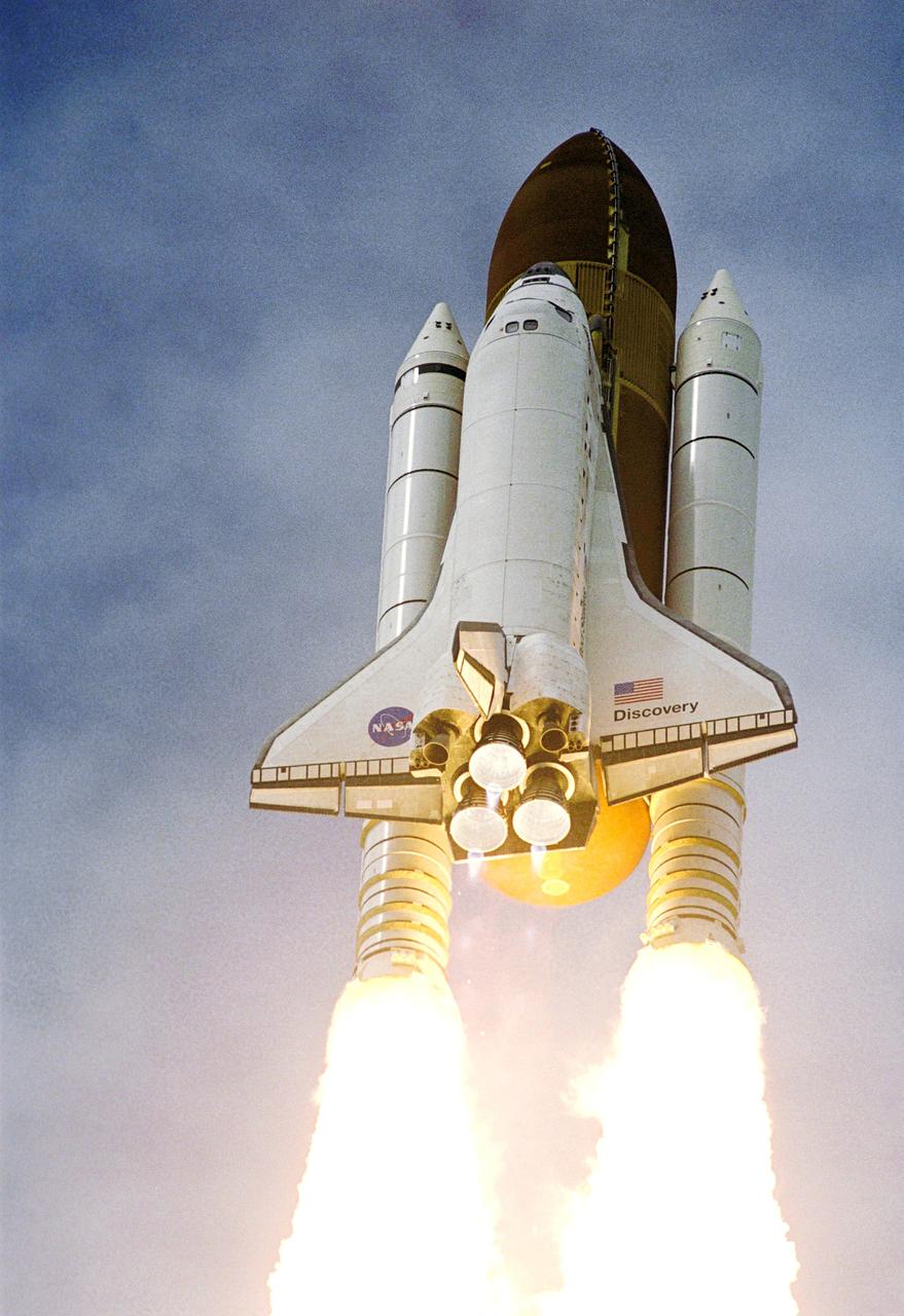 STS120-S-043 (23 Oct. 2007) --- The Space Shuttle Discovery and its seven-member STS-120 crew head toward Earth-orbit and a scheduled link-up with the International Space Station. Liftoff from Kennedy Space Center's launch pad 39A occurred at 11:38:19 a.m. (EDT). Onboard are astronauts Pam Melroy, commander; George Zamka, pilot; Scott Parazynski, Stephanie Wilson, Doug Wheelock, European Space Agency's (ESA) Paolo Nespoli and Daniel Tani, all mission specialists. Discovery will link up with the station on Thursday, Oct. 25, to begin a joint mission to continue construction by delivering the Italian-built U.S. Node 2, called Harmony. During the 14-day mission, the crew will install Harmony and move the P6 solar arrays to their permanent position and deploy them.