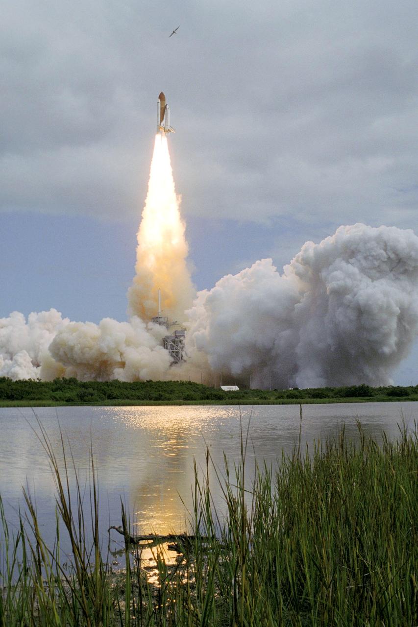 STS120-S-051 (23 Oct. 2007) --- The Space Shuttle Discovery and its seven-member STS-120 crew head toward Earth-orbit and a scheduled link-up with the International Space Station. Liftoff from Kennedy Space Center's launch pad 39A occurred at 11:38:19 a.m. (EDT). Onboard are astronauts Pam Melroy, commander; George Zamka, pilot; Scott Parazynski, Stephanie Wilson, Doug Wheelock, European Space Agency's (ESA) Paolo Nespoli and Daniel Tani, all mission specialists. Discovery will link up with the station on Thursday, Oct. 25, to begin a joint mission to continue construction by delivering the Italian-built U.S. Node 2, called Harmony. During the 14-day mission, the crew will install Harmony and move the P6 solar arrays to their permanent position and deploy them.