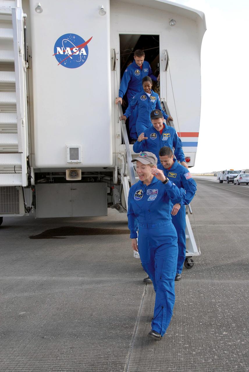 STS120-S-090 (7 Nov. 2007) --- At NASA's Kennedy Space Center, the STS-120 crewmembers exit the crew transport vehicle after their successful landing aboard Space Shuttle Discovery. Leading the way is astronaut Pam Melroy, commander; followed by George Zamka, pilot; and Scott Parazynski, Stephanie Wilson and Doug Wheelock, all mission specialists. The Discovery crew completed the 15-day STS-120 mission, with an on-time landing at 1:01:16 p.m. (EST). Wheel stop was at 1:02:07 p.m. Mission elapsed time was 15 days, 2 hours, 24 minutes and 2 seconds. The STS-120 crew continued the construction of the station with the installation of the Harmony Node 2 module and the relocation of the P6 truss.