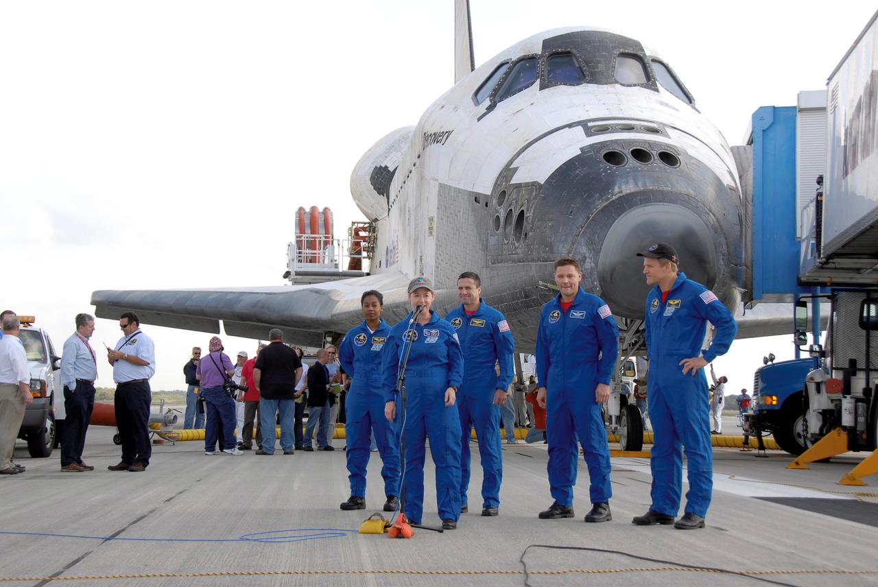 STS120-S-095 (7 Nov. 2007) --- Astronaut Pam Melroy, STS-120 commander, talks to media and guests on the Shuttle Landing Facility at NASA's Kennedy Space Center after guiding the landing of Space Shuttle Discovery. Behind Melroy are (from the left) astronauts Stephanie Wilson, mission specialist; George Zamka, pilot; Doug Wheelock and Scott Parazynski, both mission specialists. The Discovery crew completed the 15-day STS-120 mission, with an on-time landing at 1:01:16 p.m. (EST). Wheel stop was at 1:02:07 p.m. Mission elapsed time was 15 days, 2 hours, 24 minutes and 2 seconds. The STS-120 crew continued the construction of the station with the installation of the Harmony Node 2 module and the relocation of the P6 truss.