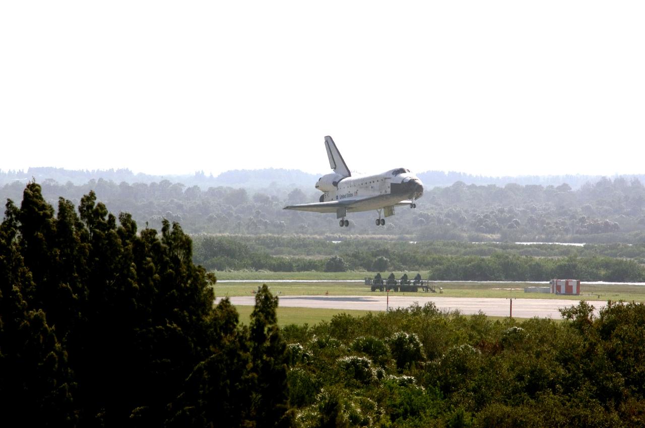 STS120-S-096 (7 Nov. 2007) --- Space Shuttle Discovery approaches landing on runway 33 of the Shuttle Landing Facility at NASA's Kennedy Space Center, concluding the 15-day STS-120 mission to the International Space Station. Onboard are astronauts Pam Melroy, commander; George Zamka, pilot; Scott Parazynski, Stephanie Wilson, Doug Wheelock, Clay Anderson and European Space Agency's (ESA) Paolo Nespoli, all mission specialists. Main gear touchdown was 1:01:16 p.m. (EST) on Nov. 7, 2007. Wheel stop was at 1:02:07 p.m. Mission elapsed time was 15 days, 2 hours, 24 minutes and 2 seconds. The STS-120 crew continued the construction of the station with the installation of the Harmony Node 2 module and the relocation of the P6 truss.