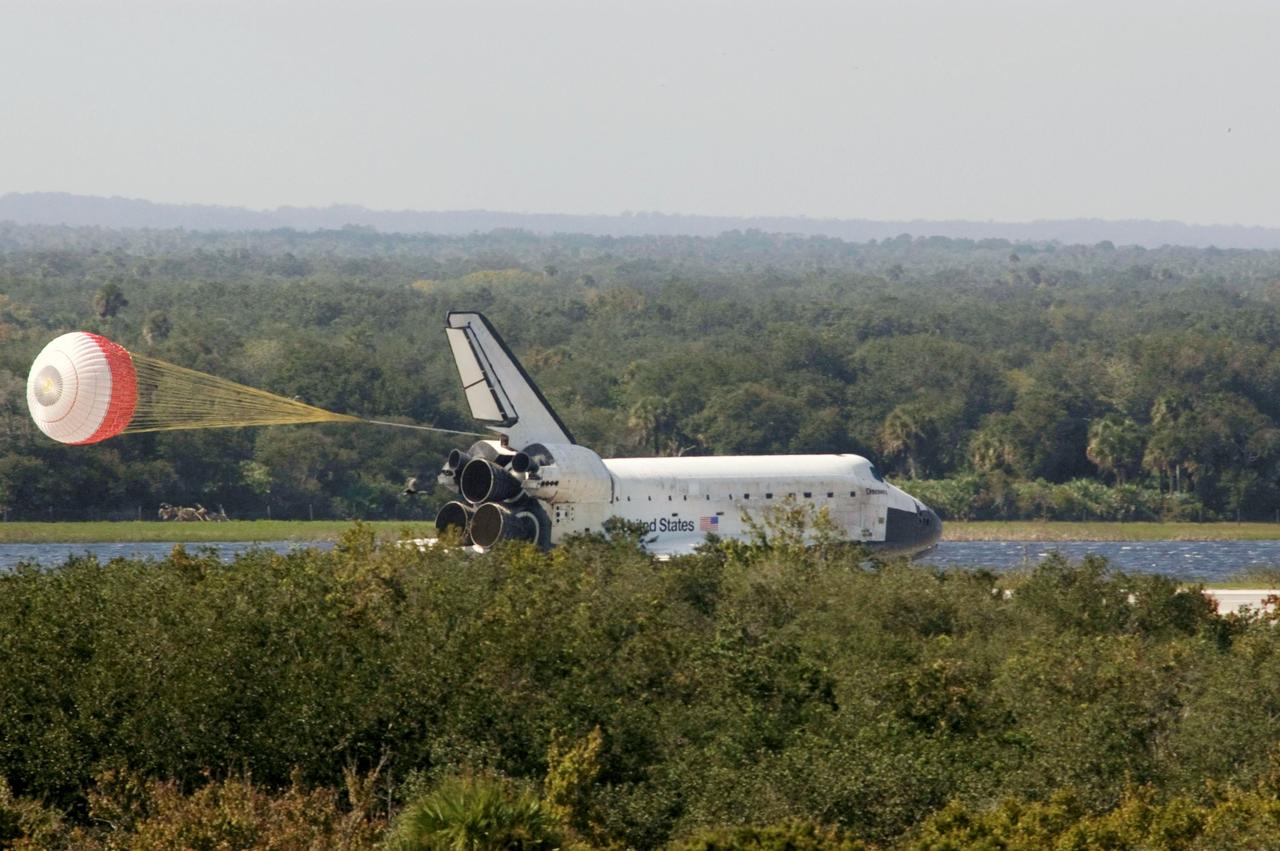 STS120-S-099 (7 Nov. 2007) --- Space Shuttle Discovery's drag chute is deployed as the spacecraft rolls toward wheels stop on runway 33 of the Shuttle Landing Facility at NASA's Kennedy Space Center, concluding the 15-day STS-120 mission to the International Space Station. Onboard are astronauts Pam Melroy, commander; George Zamka, pilot; Scott Parazynski, Stephanie Wilson, Doug Wheelock, Clay Anderson and European Space Agency's (ESA) Paolo Nespoli, all mission specialists. Main gear touchdown was 1:01:16 p.m. (EST) on Nov. 7, 2007. Wheel stop was at 1:02:07 p.m. Mission elapsed time was 15 days, 2 hours, 24 minutes and 2 seconds. The STS-120 crew continued the construction of the station with the installation of the Harmony Node 2 module and the relocation of the P6 truss.
