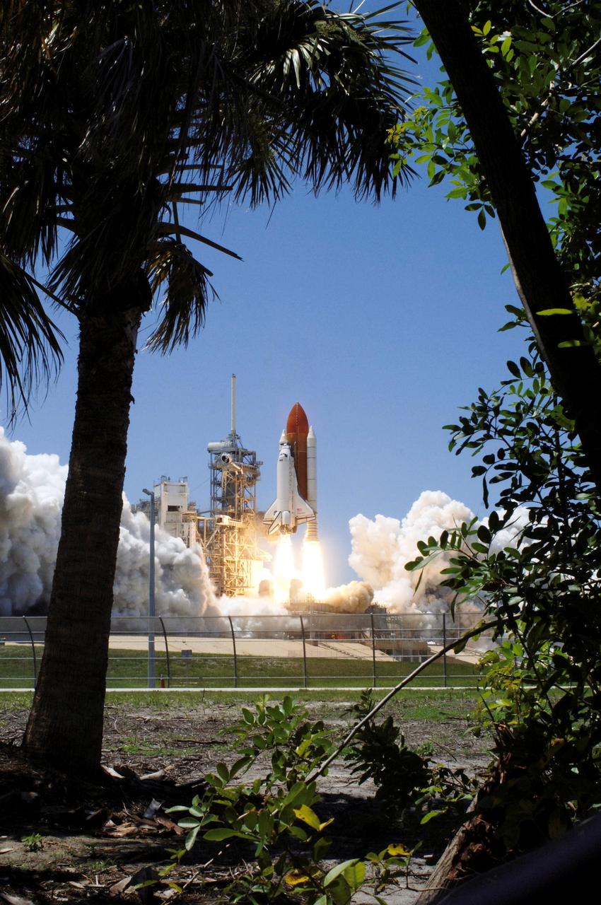 STS121-S-018 (4 July 2006) --- Space Shuttle Discovery and its seven-member crew launched at 2:38 p.m. (EDT) to begin the two-day journey to the International Space Station on the historic Return to Flight STS-121 mission. Discovery is slated to dock with the station at 10:52 a.m. (EDT) Thursday July 6, 2006. The shuttle made history as it was the first human-occupying spacecraft to launch on Independence Day. During the 12-day mission, the STS-121 crew of seven will test new equipment and procedures to improve shuttle safety, as well as deliver supplies and make repairs to the space station.