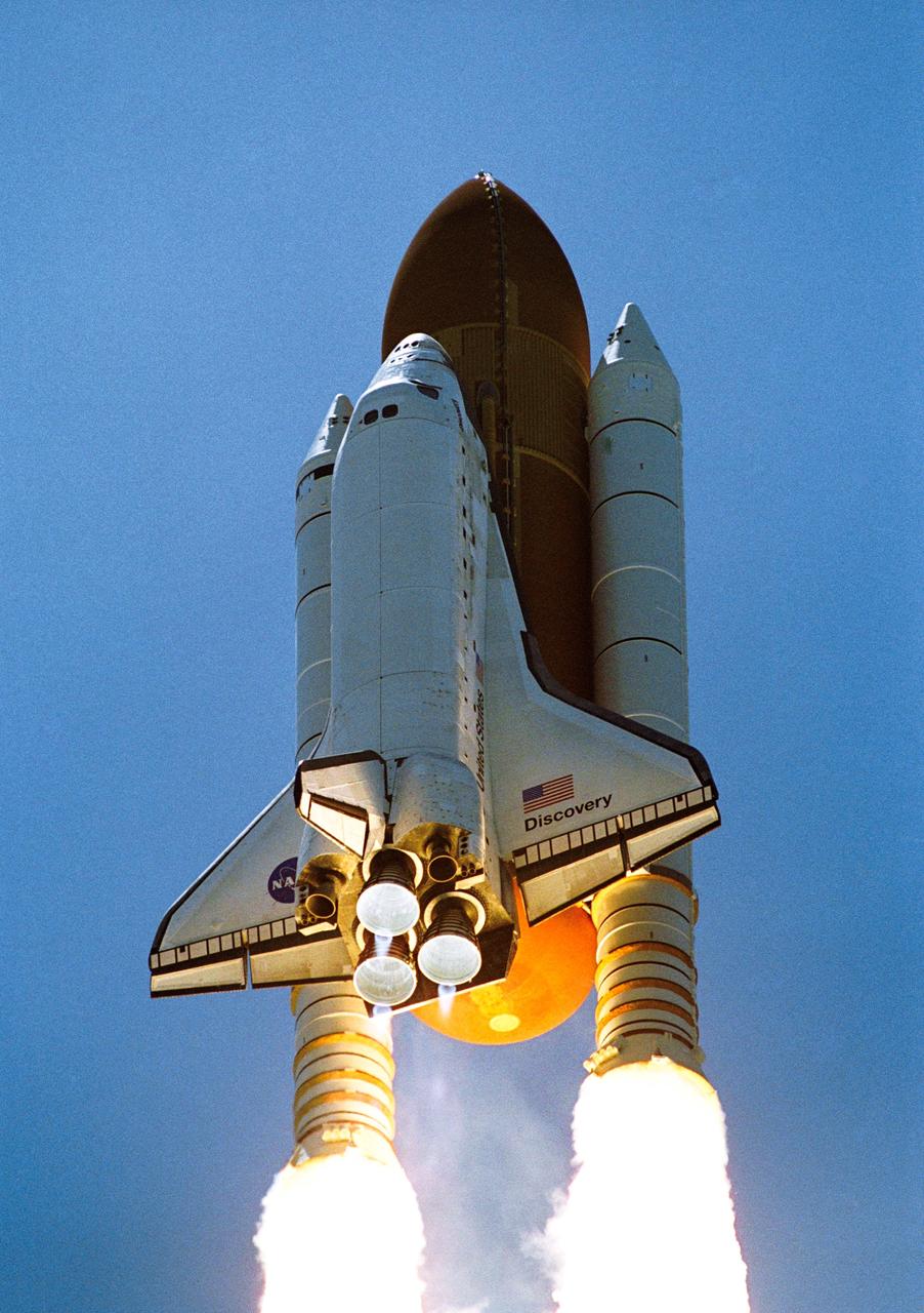 STS121-S-027 (4 July 2006) --- Space Shuttle Discovery and its seven-member crew launched at 2:38 p.m. (EDT) to begin the two-day journey to the International Space Station on the historic Return to Flight STS-121 mission. Discovery is slated to dock with the station at 10:52 a.m. (EDT) Thursday July 6, 2006. The shuttle made history as it was the first human-occupying spacecraft to launch on Independence Day. During the 12-day mission, the STS-121 crew of seven will test new equipment and procedures to improve shuttle safety, as well as deliver supplies and make repairs to the space station.