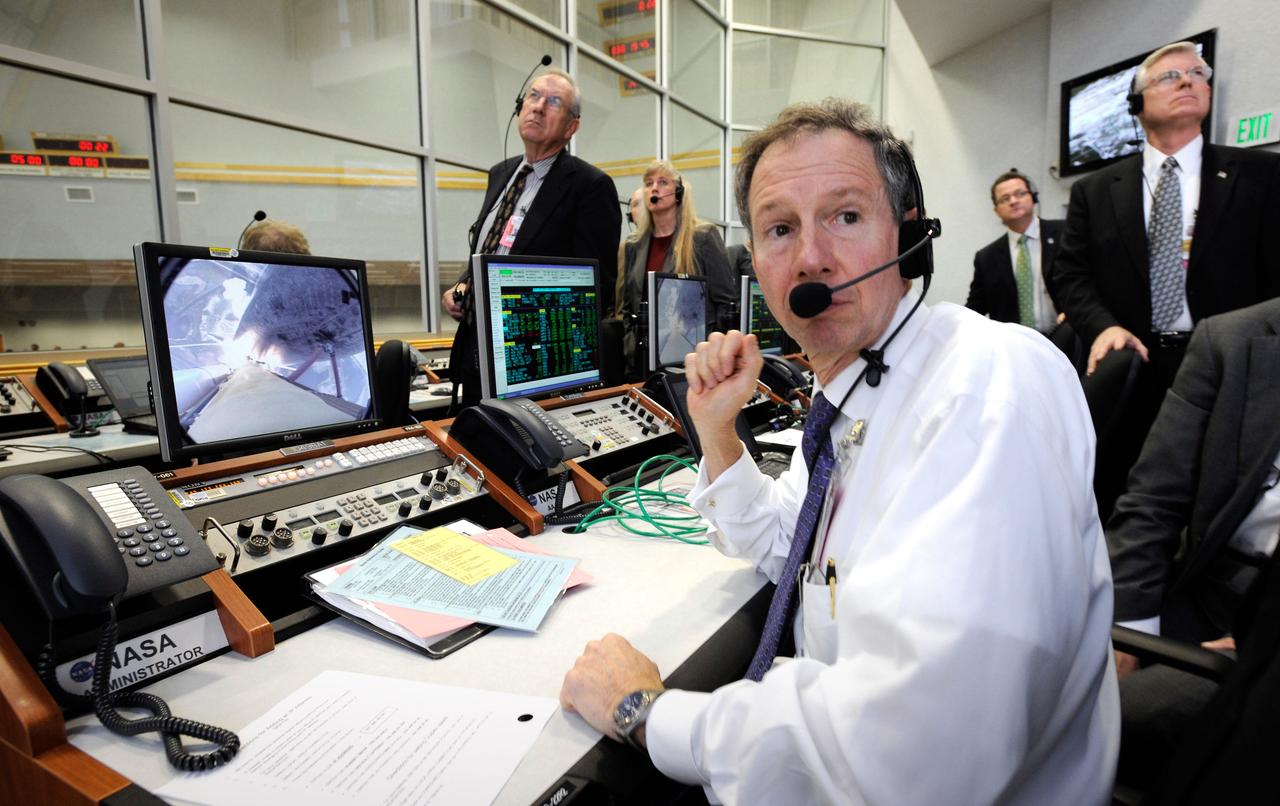 NASA Administrator, Michael Griffin and other management watch the launch of the Space Shuttle Atlantis (STS-122) from the Launch Control Center Thursday, Feb. 7, 2008, at the Kennedy Space Center in Cape Canaveral, Fla. The Shuttle lifted off from launch pad 39A at 2:45p.m. EST. Photo Credit: (NASA/Bill Ingalls)