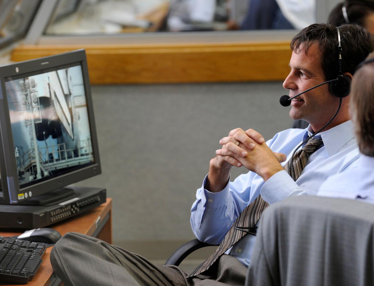 Launch Director for the space shuttle Atlantis, Doug Lyons monitors the weather and shuttle systems prior to the launch of the Space Shuttle Atlantis (STS-122) from the Launch Control Center Thursday, Feb. 7, 2008, at the Kennedy Space Center in Cape Canaveral, Fla. The Shuttle lifted off from launch pad 39A at 2:45p.m. EST. Photo Credit: (NASA/Bill Ingalls)