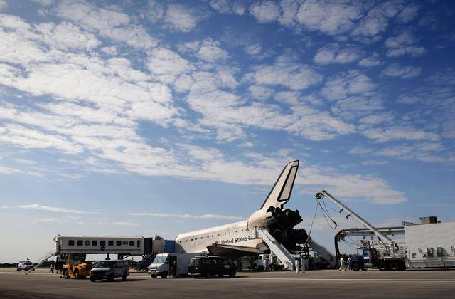The space shuttle Atlantis (STS-122) is serviced by support vehicles and crew at the Shuttle Landing Facility after the safe landing at 9:07a.m., Wednesday, Feb. 20, 2008 at Kennedy Space Center, Fla. Atlantis and the crew of STS-122 completed delivery of the European Space Agency’s (ESA) Columbus laboratory to the International Space Station. Photo Credit: (NASA/Bill Ingalls)