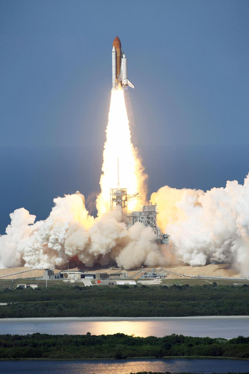 STS124-S-009 (31 May 2008) --- The Space Shuttle Discovery and its seven-member STS-124 crew head toward Earth-orbit and a scheduled link-up with the International Space Station (ISS). Liftoff from Kennedy Space Center's launch pad 39A occurred at 5:02 p.m. (EDT). The STS-124 mission is the 26th in the assembly of the International Space Station. It is the second of three flights launching components to complete JAXA's Kibo laboratory. During the mission, the shuttle crew will install Kibo's large Japanese Pressurized Module and its remote manipulator system. Onboard are astronauts Mark Kelly, commander; Ken Ham, pilot; Karen Nyberg, Mike Fossum, Ron Garan, Greg Chamitoff and Japan Aerospace Exploration Agency (JAXA) astronaut Akihiko Hoshide, all mission specialists. Chamitoff will join Expedition 17 in progress to serve as a flight engineer aboard the station.