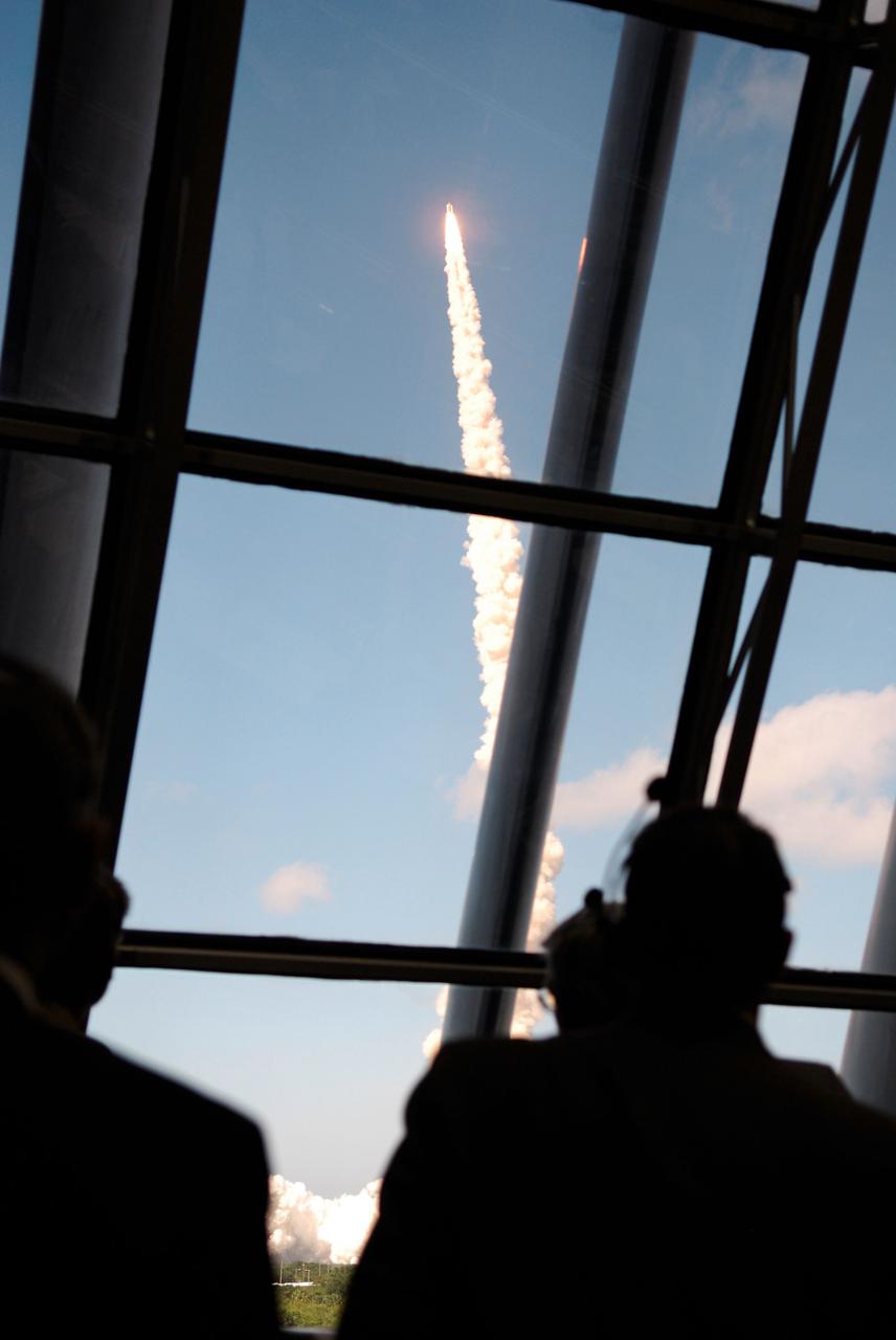 STS124-S-016 (31 May 2008) --- View of personnel watching the launch of Space Shuttle Discovery through the windows of the Launch Control Center at the Kennedy Space Center. Discovery lifted off from launch pad 39A at 5:02 p.m. (EDT). The STS-124 mission is the 26th in the assembly of the International Space Station. It is the second of three flights launching components to complete JAXA's Kibo laboratory. During the mission, the shuttle crew will install Kibo's large Japanese Pressurized Module and its remote manipulator system. Onboard are astronauts Mark Kelly, commander; Ken Ham, pilot; Karen Nyberg, Mike Fossum, Ron Garan, Greg Chamitoff and Japan Aerospace Exploration Agency (JAXA) astronaut Akihiko Hoshide, all mission specialists. Chamitoff will join Expedition 17 in progress to serve as a flight engineer aboard the station.