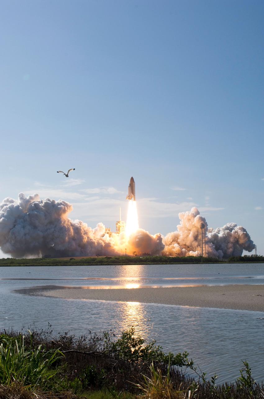 STS124-S-027 (31 May 2008) --- The Space Shuttle Discovery and its seven-member STS-124 crew head toward Earth-orbit and a scheduled link-up with the International Space Station (ISS). Liftoff from Kennedy Space Center's launch pad 39A occurred at 5:02 p.m. (EDT). The STS-124 mission is the 26th in the assembly of the International Space Station. It is the second of three flights launching components to complete JAXA's Kibo laboratory. During the mission, the shuttle crew will install Kibo's large Japanese Pressurized Module and its remote manipulator system. Onboard are astronauts Mark Kelly, commander; Ken Ham, pilot; Karen Nyberg, Mike Fossum, Ron Garan, Greg Chamitoff and Japan Aerospace Exploration Agency (JAXA) astronaut Akihiko Hoshide, all mission specialists. Chamitoff will join Expedition 17 in progress to serve as a flight engineer aboard the station.
