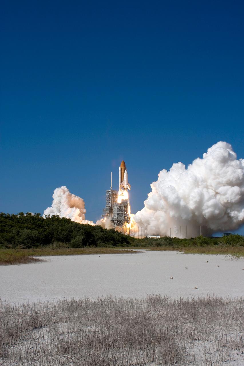 STS124-S-033 (31 May 2008) --- The Space Shuttle Discovery and its seven-member STS-124 crew head toward Earth-orbit and a scheduled link-up with the International Space Station (ISS). Liftoff from Kennedy Space Center's launch pad 39A occurred at 5:02 p.m. (EDT). The STS-124 mission is the 26th in the assembly of the International Space Station. It is the second of three flights launching components to complete JAXA's Kibo laboratory. During the mission, the shuttle crew will install Kibo's large Japanese Pressurized Module and its remote manipulator system. Onboard are astronauts Mark Kelly, commander; Ken Ham, pilot; Karen Nyberg, Mike Fossum, Ron Garan, Greg Chamitoff and Japan Aerospace Exploration Agency (JAXA) astronaut Akihiko Hoshide, all mission specialists. Chamitoff will join Expedition 17 in progress to serve as a flight engineer aboard the station.