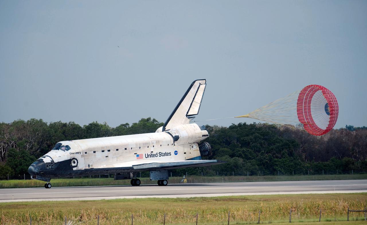 The space shuttle Discovery touches down at 11:15 a.m. EDT, Saturday, June 14, 2008, at the Kennedy Space Center in Florida.  During the 13-day mission, Discovery and the crew of STS-124 delivered new components of the Japanese Experiment Module, or Kibo, to the International Space Station and the Canadian-built Special Purpose Dextrous Manipulator to the International Space Station.  Photo Credit: (NASA/Bill Ingalls)