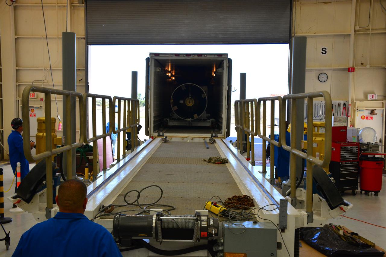 Inside Building 1555 at Vandenberg Air Force Base in California, technicians and engineers offload the first stage motor for the Orbital ATK Pegasus XL rocket which will launch eight NASA Cyclone Global Navigation Satellite System, or CYGNSS, spacecraft. When preparations are completed at Vandenberg, the rocket, with CYGNSS in its payload fairing, will be attached to the Orbital ATK L-1011 carrier aircraft and transported to NASA’s Kennedy Space Center in Florida. On Dec. 12, 2016, the carrier aircraft is scheduled to take off from the Skid Strip at Cape Canaveral Air Force Station and CYGNSS will launch on the Pegasus XL rocket with the L-1011 flying off shore. CYGNSS will make frequent and accurate measurements of ocean surface winds throughout the life cycle of tropical storms and hurricanes. The data that CYGNSS provides will enable scientists to probe key air-sea interaction processes that take place near the core of storms, which are rapidly changing and play a critical role in the beginning and intensification of hurricanes.