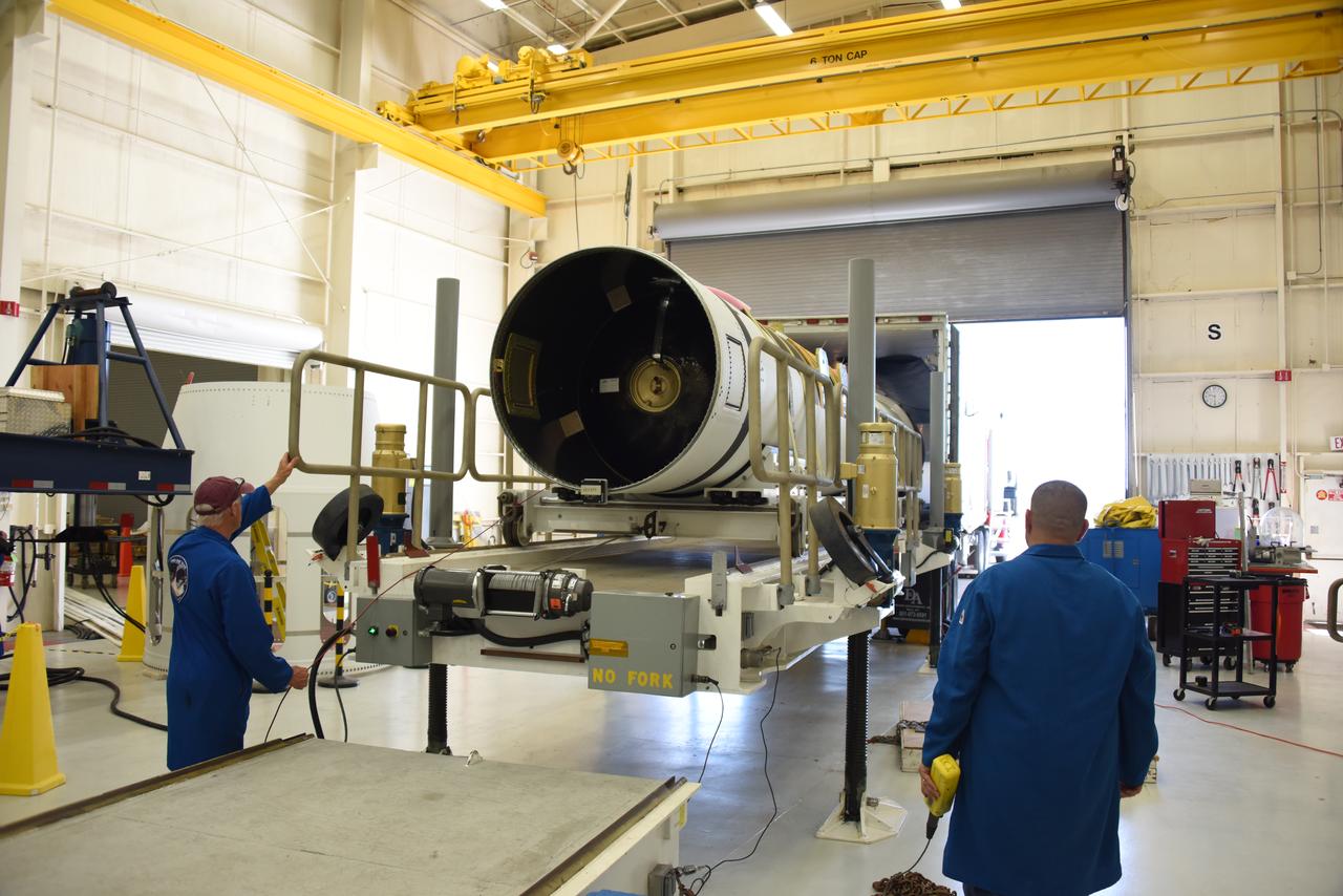 Inside Building 1555 at Vandenberg Air Force Base in California, technicians and engineers offload the first stage motor for the Orbital ATK Pegasus XL rocket which will launch eight NASA Cyclone Global Navigation Satellite System, or CYGNSS, spacecraft. When preparations are completed at Vandenberg, the rocket, with CYGNSS in its payload fairing, will be attached to the Orbital ATK L-1011 carrier aircraft and transported to NASA’s Kennedy Space Center in Florida. On Dec. 12, 2016, the carrier aircraft is scheduled to take off from the Skid Strip at Cape Canaveral Air Force Station and CYGNSS will launch on the Pegasus XL rocket with the L-1011 flying off shore. CYGNSS will make frequent and accurate measurements of ocean surface winds throughout the life cycle of tropical storms and hurricanes. The data that CYGNSS provides will enable scientists to probe key air-sea interaction processes that take place near the core of storms, which are rapidly changing and play a critical role in the beginning and intensification of hurricanes.