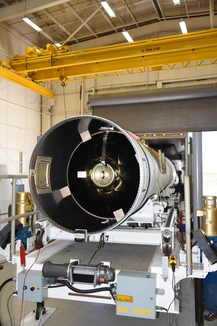 Inside Building 1555 at Vandenberg Air Force Base in California, technicians and engineers offload the first stage motor for the Orbital ATK Pegasus XL rocket which will launch eight NASA Cyclone Global Navigation Satellite System, or CYGNSS, spacecraft. When preparations are completed at Vandenberg, the rocket, with CYGNSS in its payload fairing, will be attached to the Orbital ATK L-1011 carrier aircraft and transported to NASA’s Kennedy Space Center in Florida. On Dec. 12, 2016, the carrier aircraft is scheduled to take off from the Skid Strip at Cape Canaveral Air Force Station and CYGNSS will launch on the Pegasus XL rocket with the L-1011 flying off shore. CYGNSS will make frequent and accurate measurements of ocean surface winds throughout the life cycle of tropical storms and hurricanes. The data that CYGNSS provides will enable scientists to probe key air-sea interaction processes that take place near the core of storms, which are rapidly changing and play a critical role in the beginning and intensification of hurricanes.
