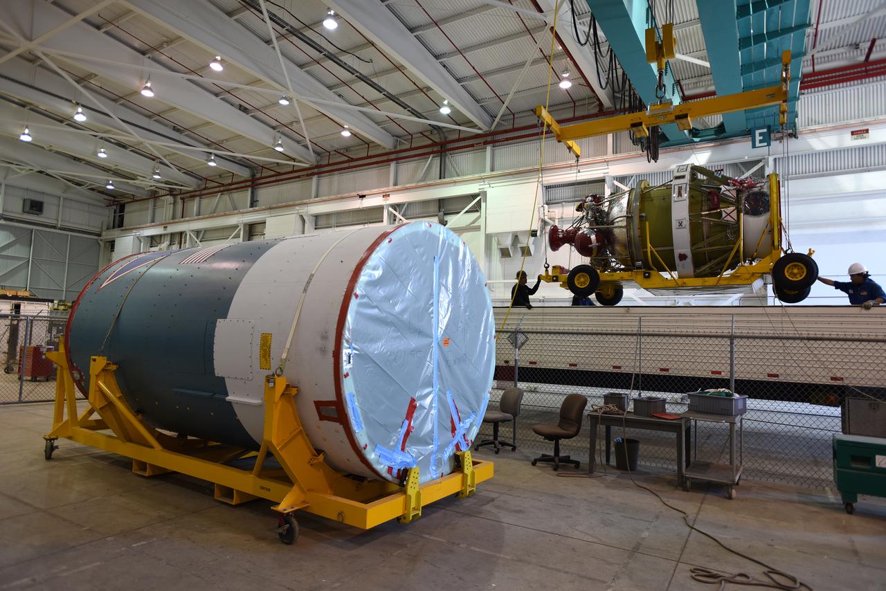 Technicians offload the second stage of a Delta II rocket from a transport trailer inside NASA Hangar 836 at Vandenberg Air Force Base in California in preparation to launch the Joint Polar Satellite System spacecraft in 2017. JPSS-1 is part of the next-generation environmental satellite system, a collaborative program between the National Oceanic and Atmospheric Administration (NOAA) and NASA. To learn more about JPSS-1, visit http://www.jpss.noaa.gov.